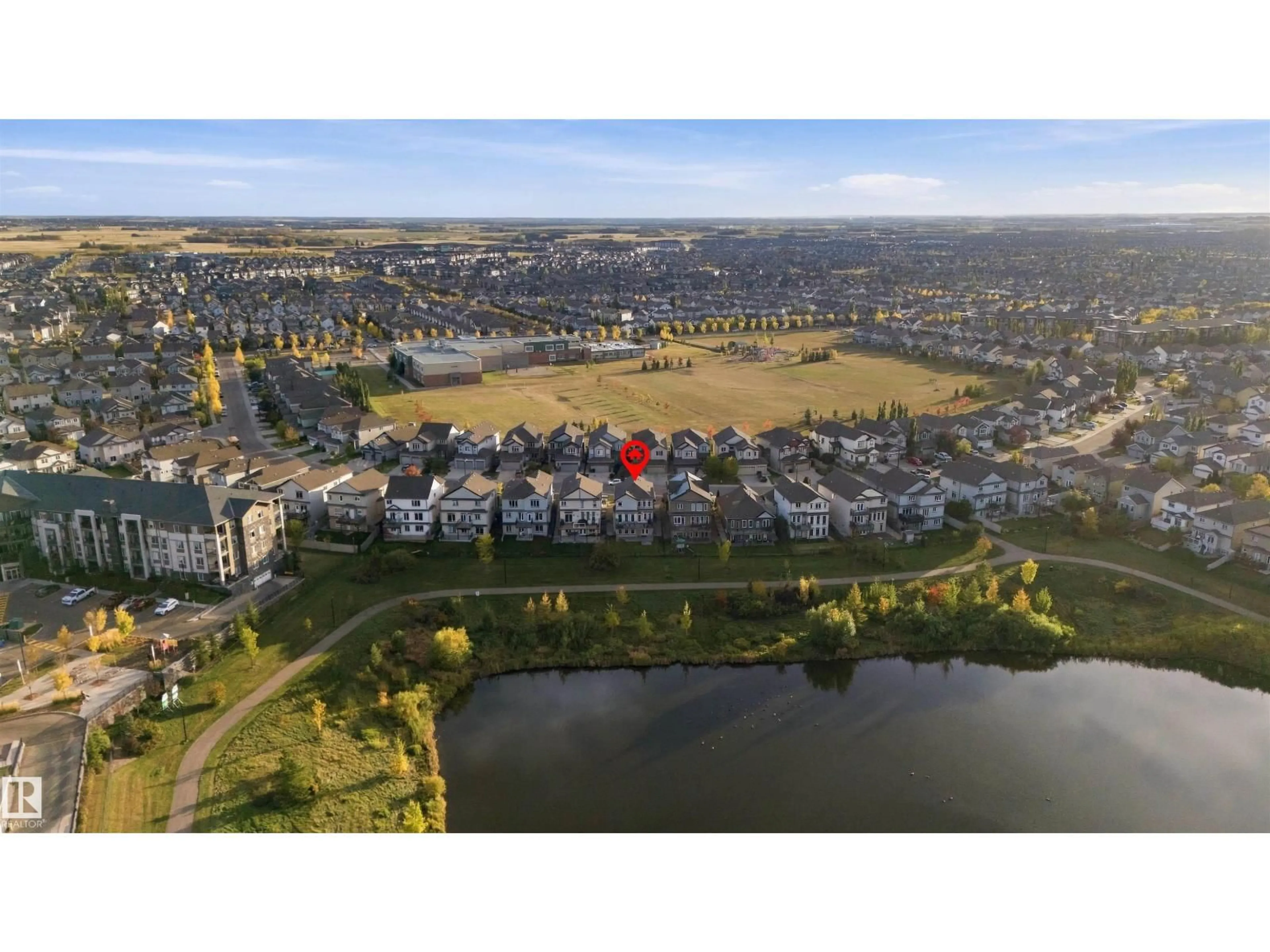 A pic from outside/outdoor area/front of a property/back of a property/a pic from drone, water/lake/river/ocean view for 5708 12 AV, Edmonton Alberta T6X1R4