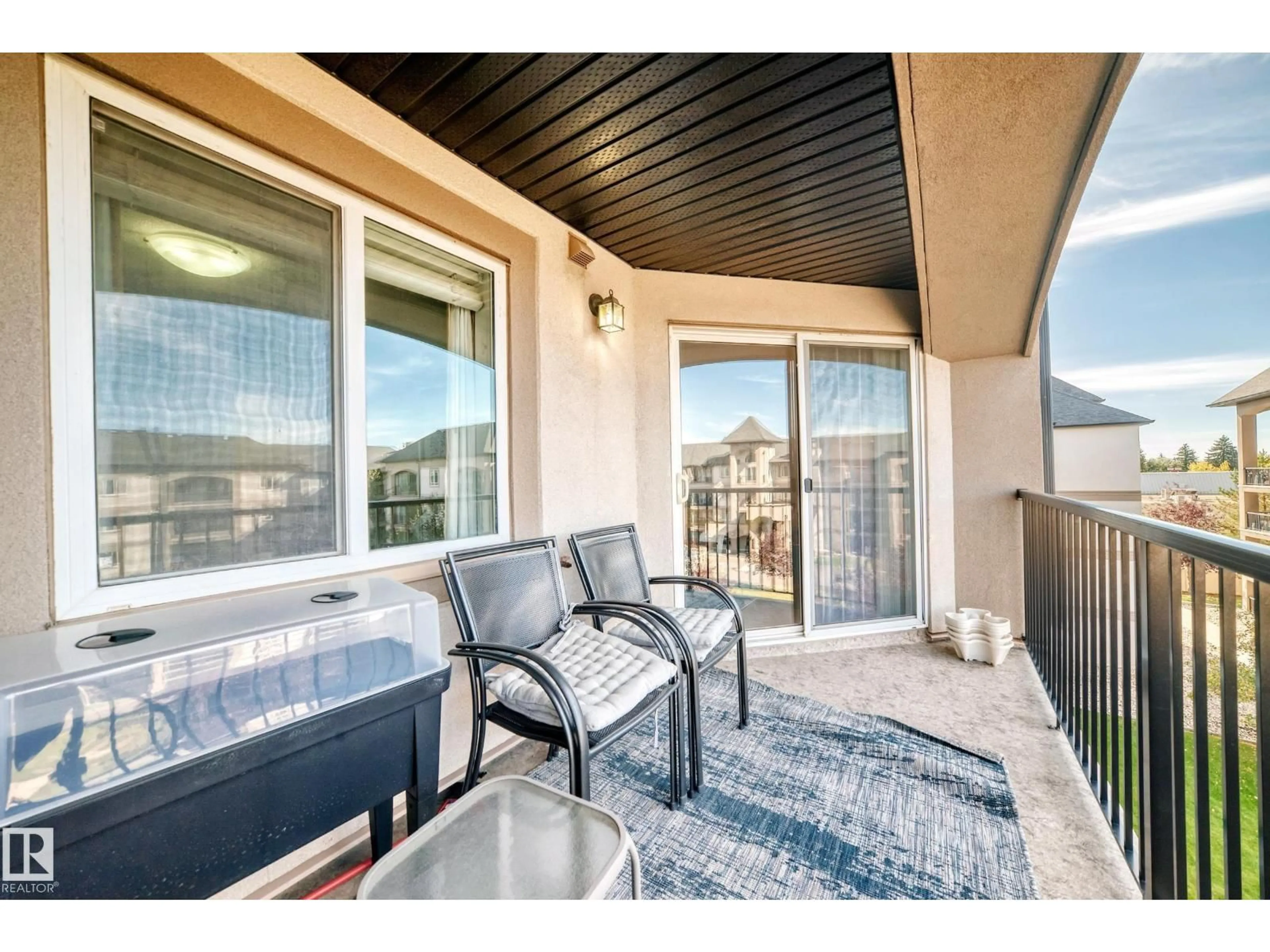 Patio, water/lake/river/ocean view for 13005 - 430 140 AV, Edmonton Alberta T6V1X1