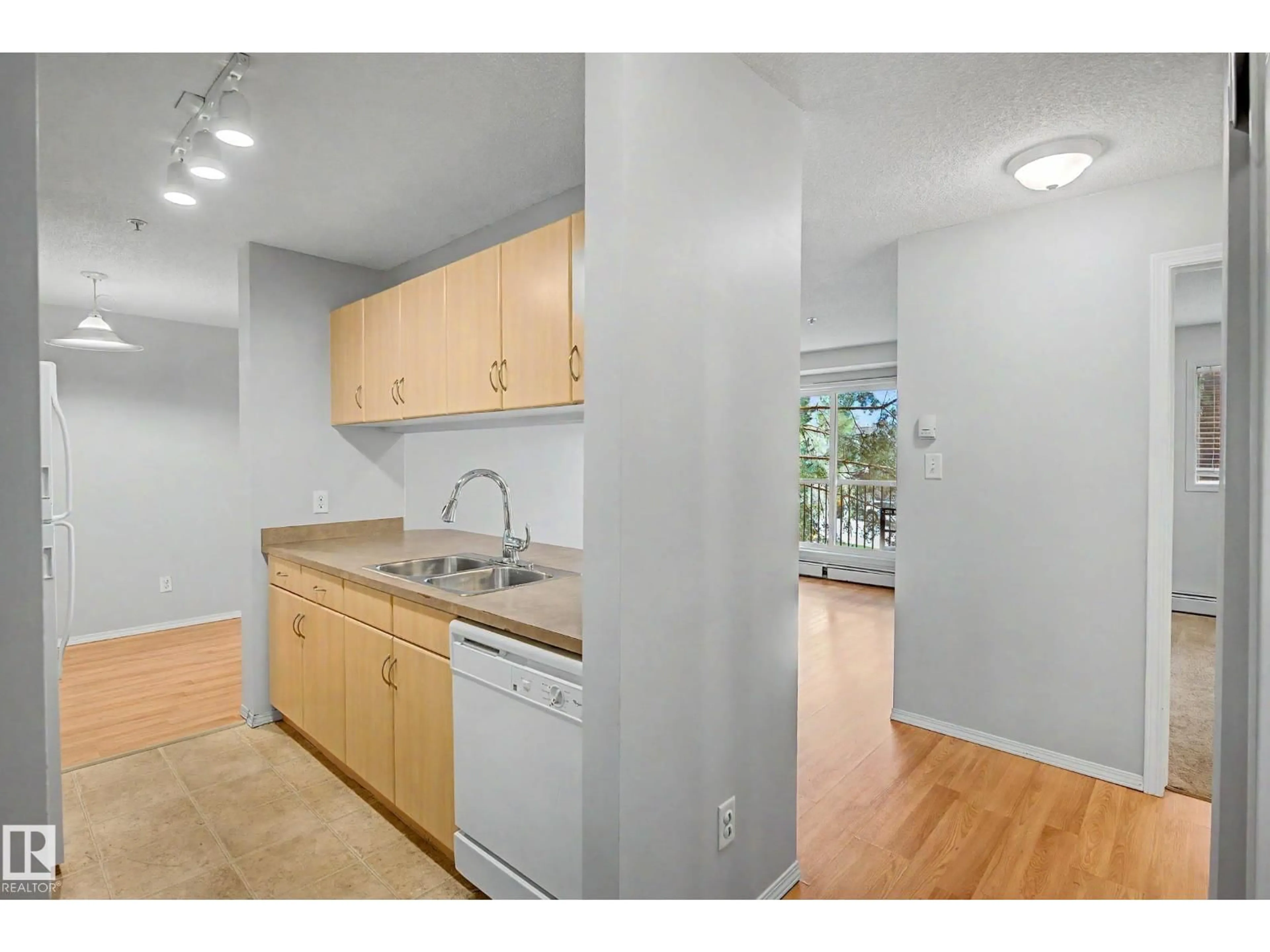 Standard kitchen, unknown for #204 - 2430 GUARDIAN RD, Edmonton Alberta T5T6X9