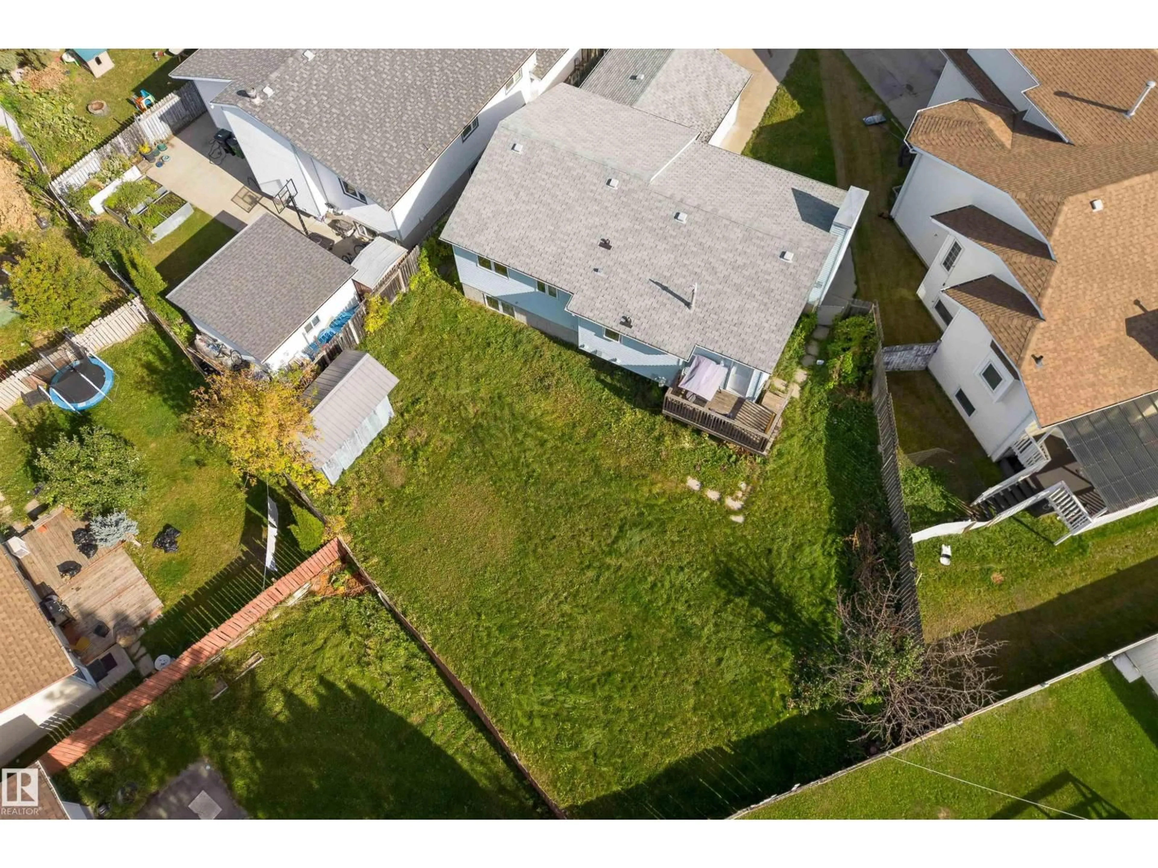 A pic from outside/outdoor area/front of a property/back of a property/a pic from drone, street for 4151 28 AV, Edmonton Alberta T6L4H2