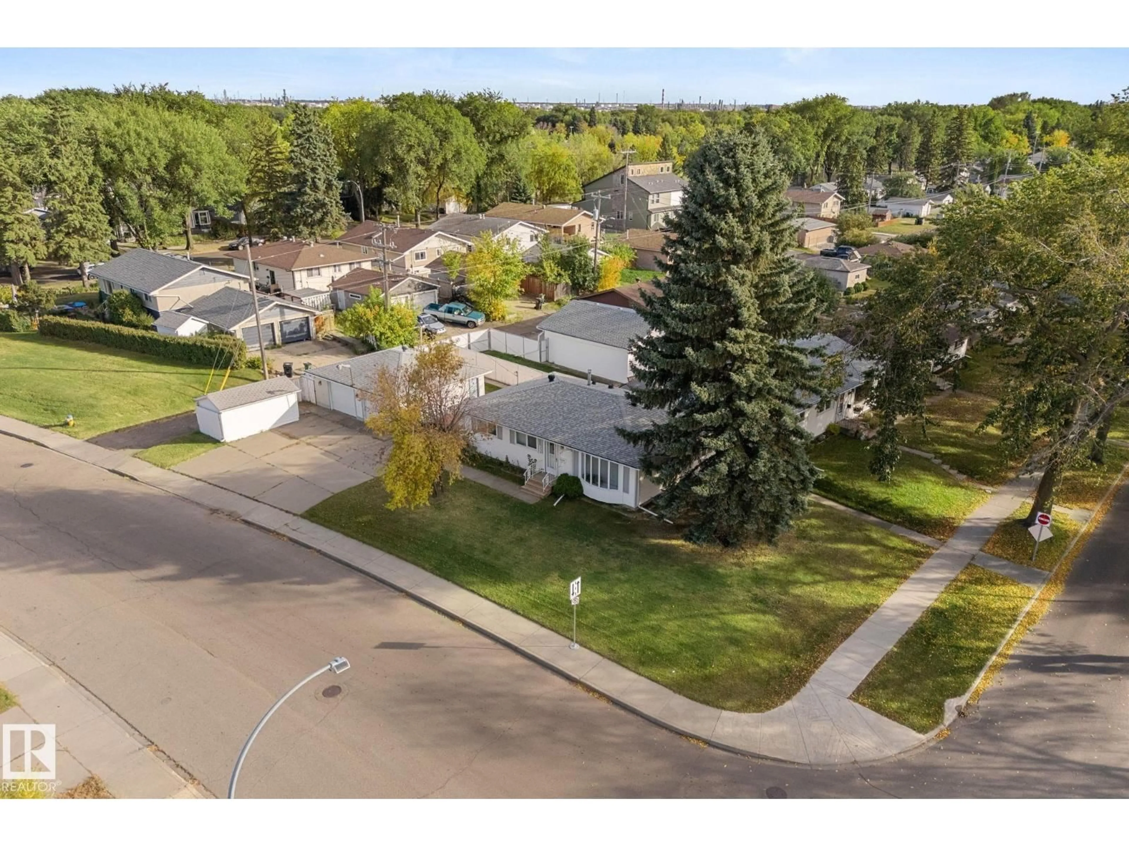 A pic from outside/outdoor area/front of a property/back of a property/a pic from drone, street for NW - 12227 58 ST, Edmonton Alberta T5W3X6