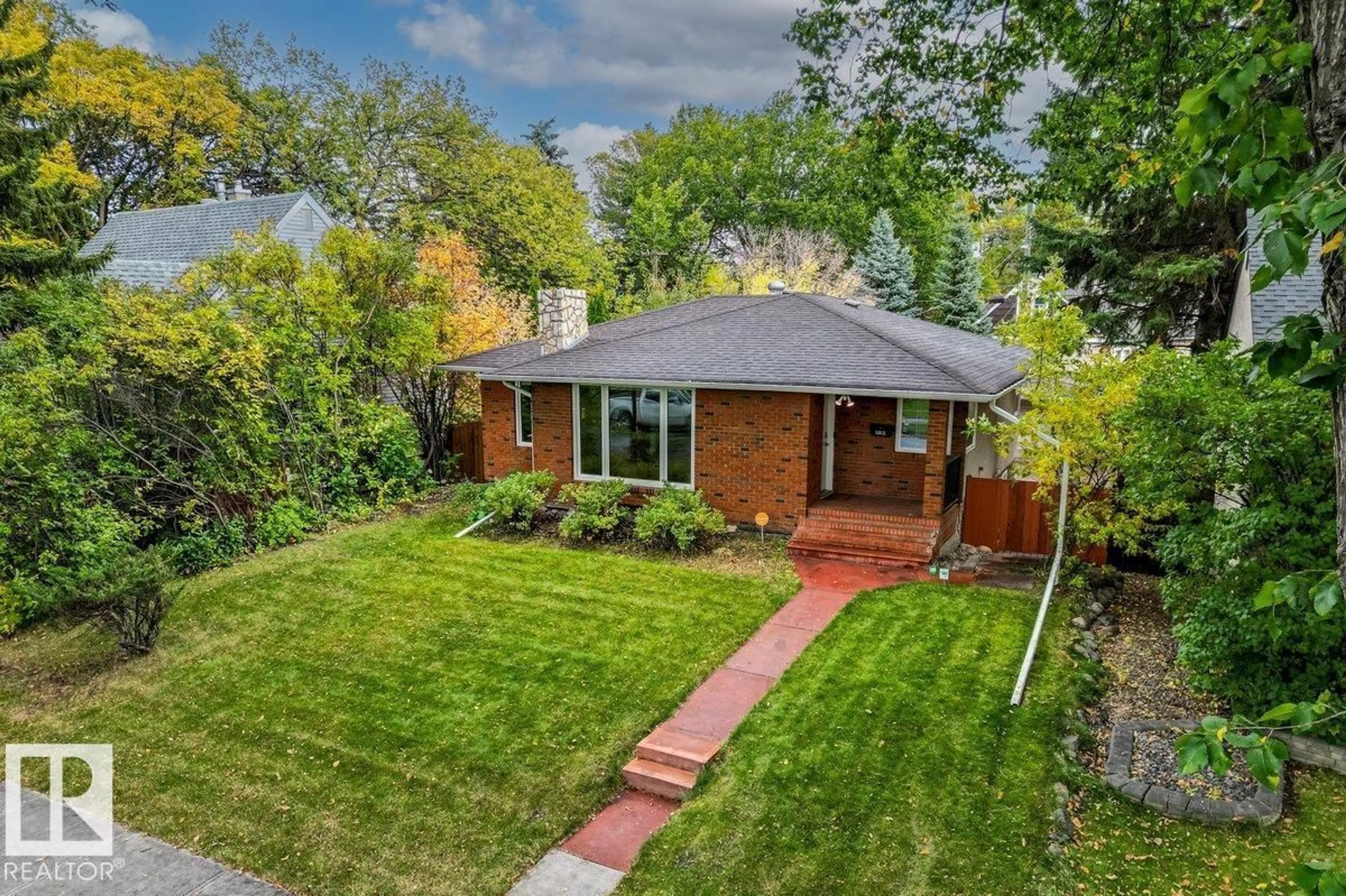 Home with brick exterior material, street for 11631 130 ST, Edmonton Alberta T5M1A7
