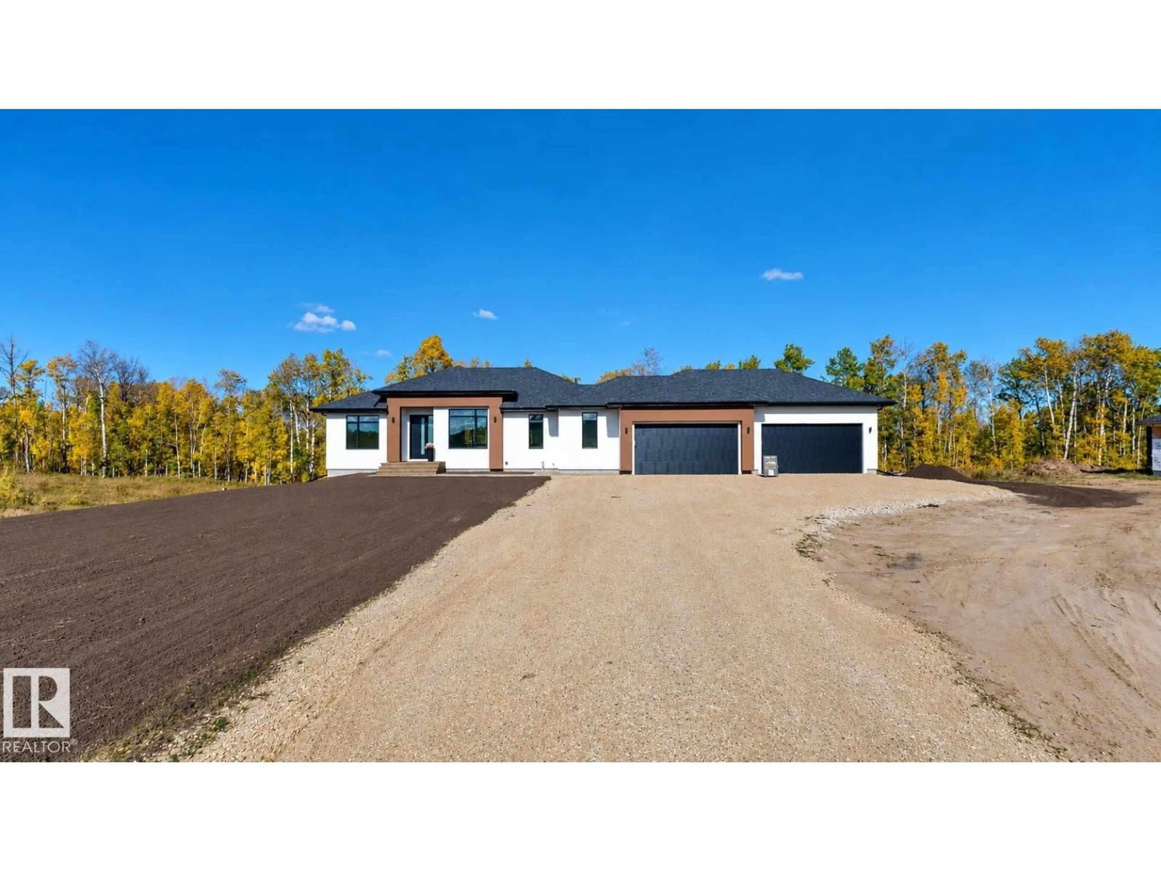 Home with vinyl exterior material, building for 13 - 20 53214 RANGE RD, Rural Parkland County Alberta T7Y0C1