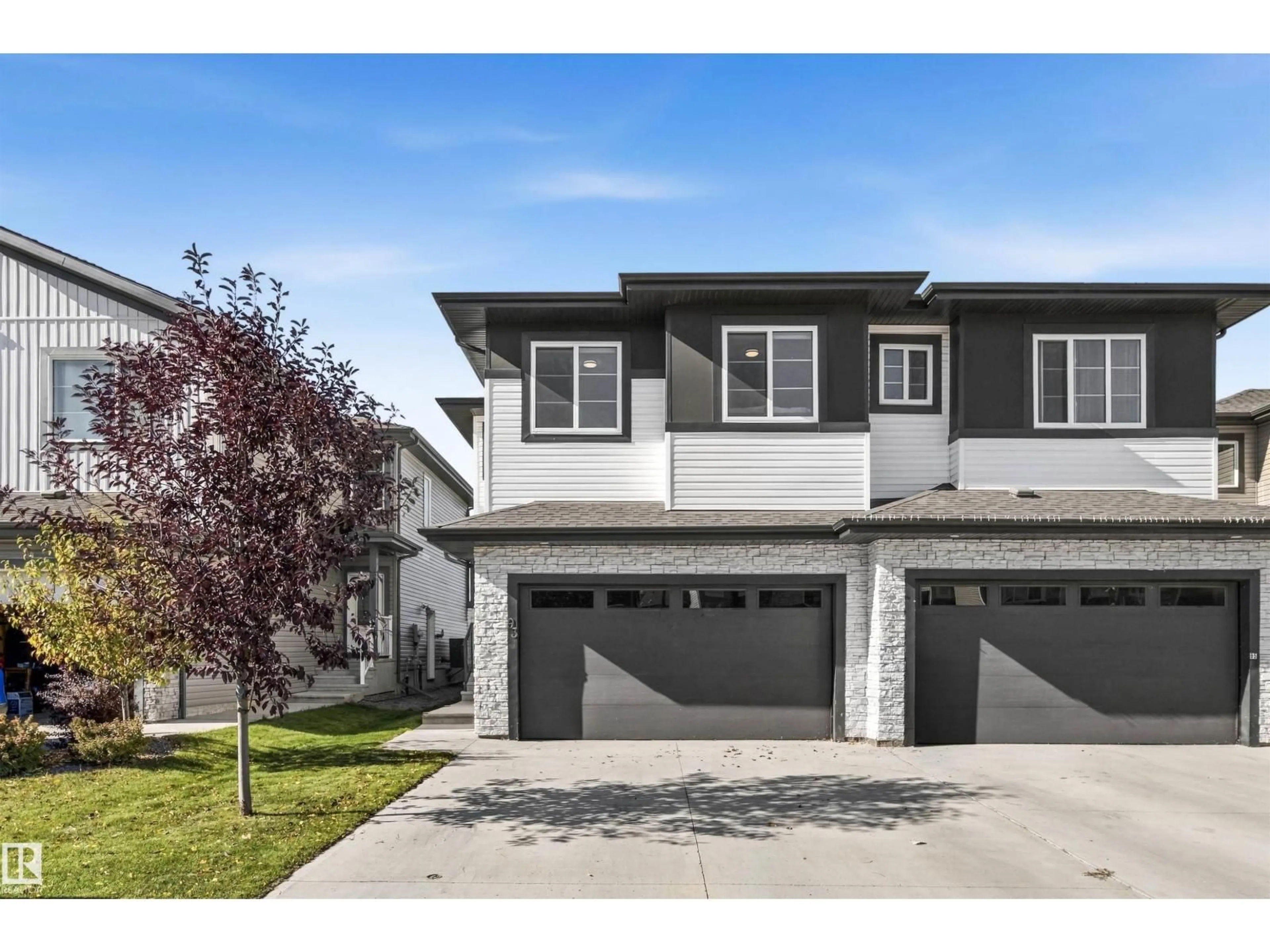 Home with vinyl exterior material, street for 93 SPRINGBROOK WD, Spruce Grove Alberta T7X0X9