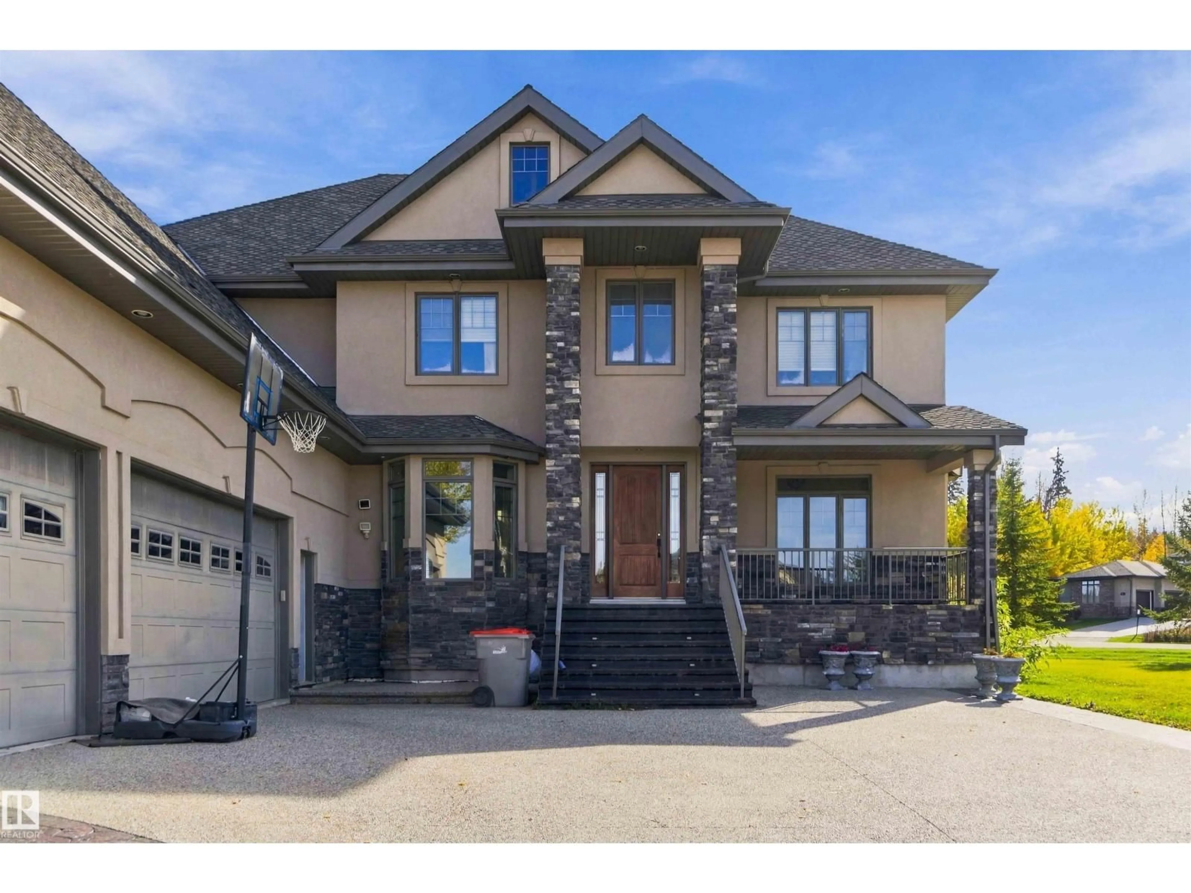 Home with brick exterior material, street for 65 53217 RGE ROAD 263, Rural Parkland County Alberta T7X3G2