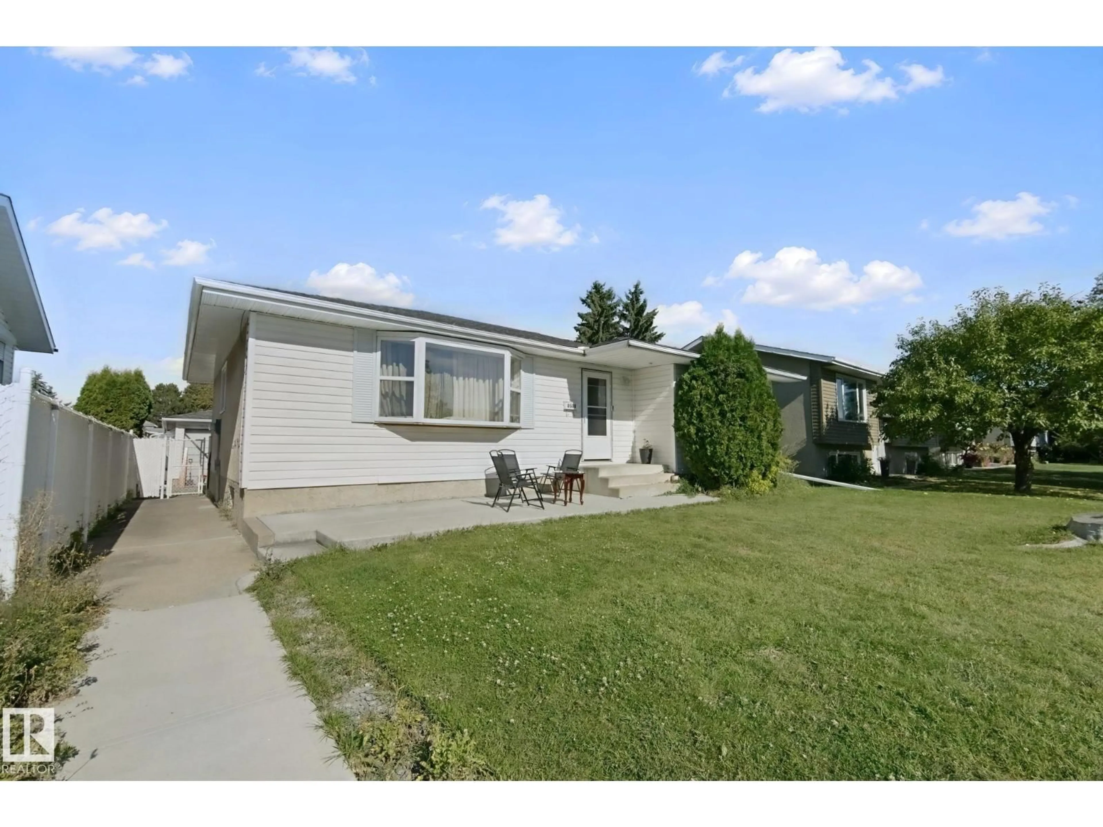 Home with vinyl exterior material, street for 8508 149A AV, Edmonton Alberta T5E2Z2