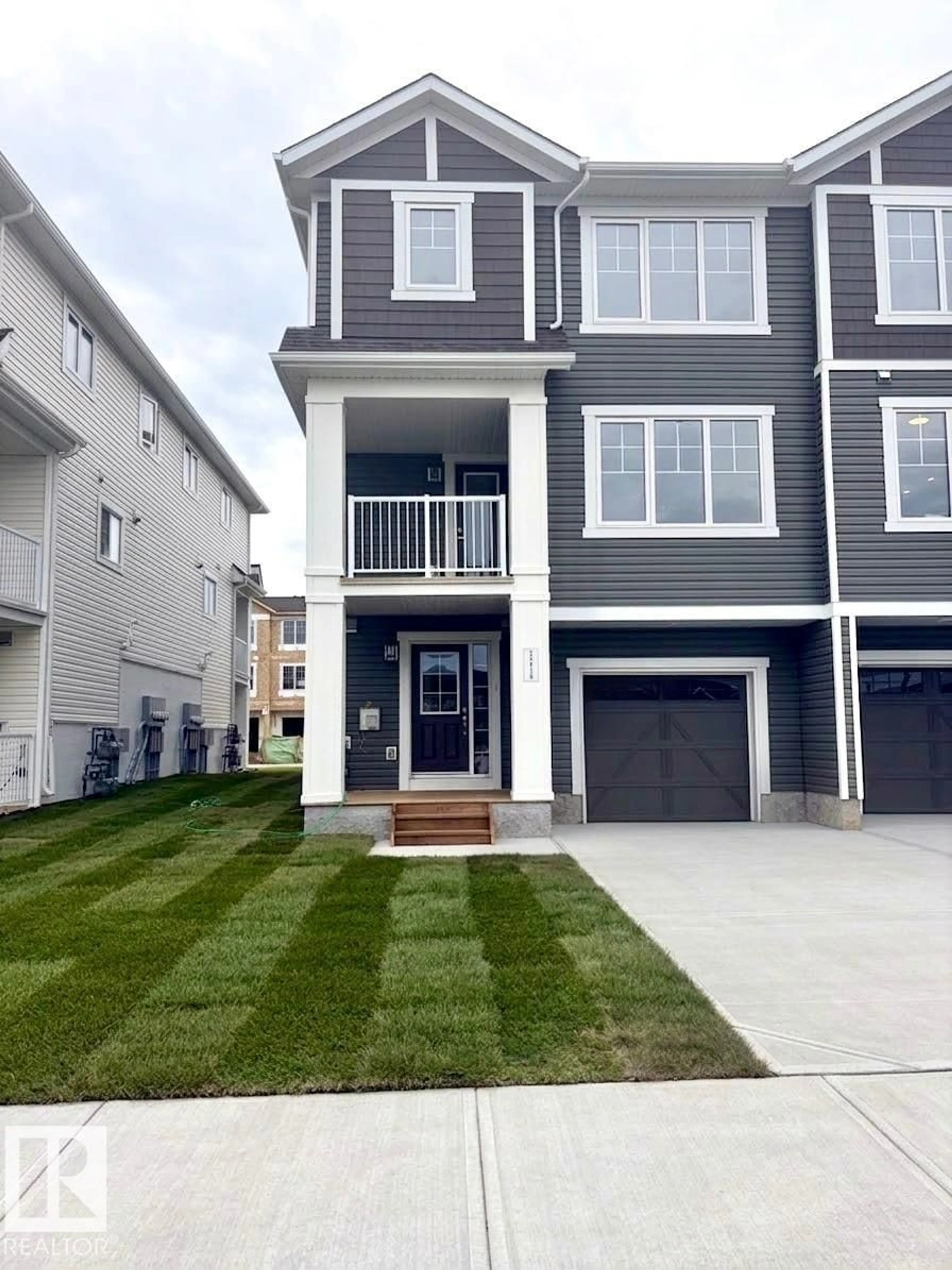 Home with vinyl exterior material, street for 1214 STONESIDE RD, Sherwood Park Alberta T8H3A4