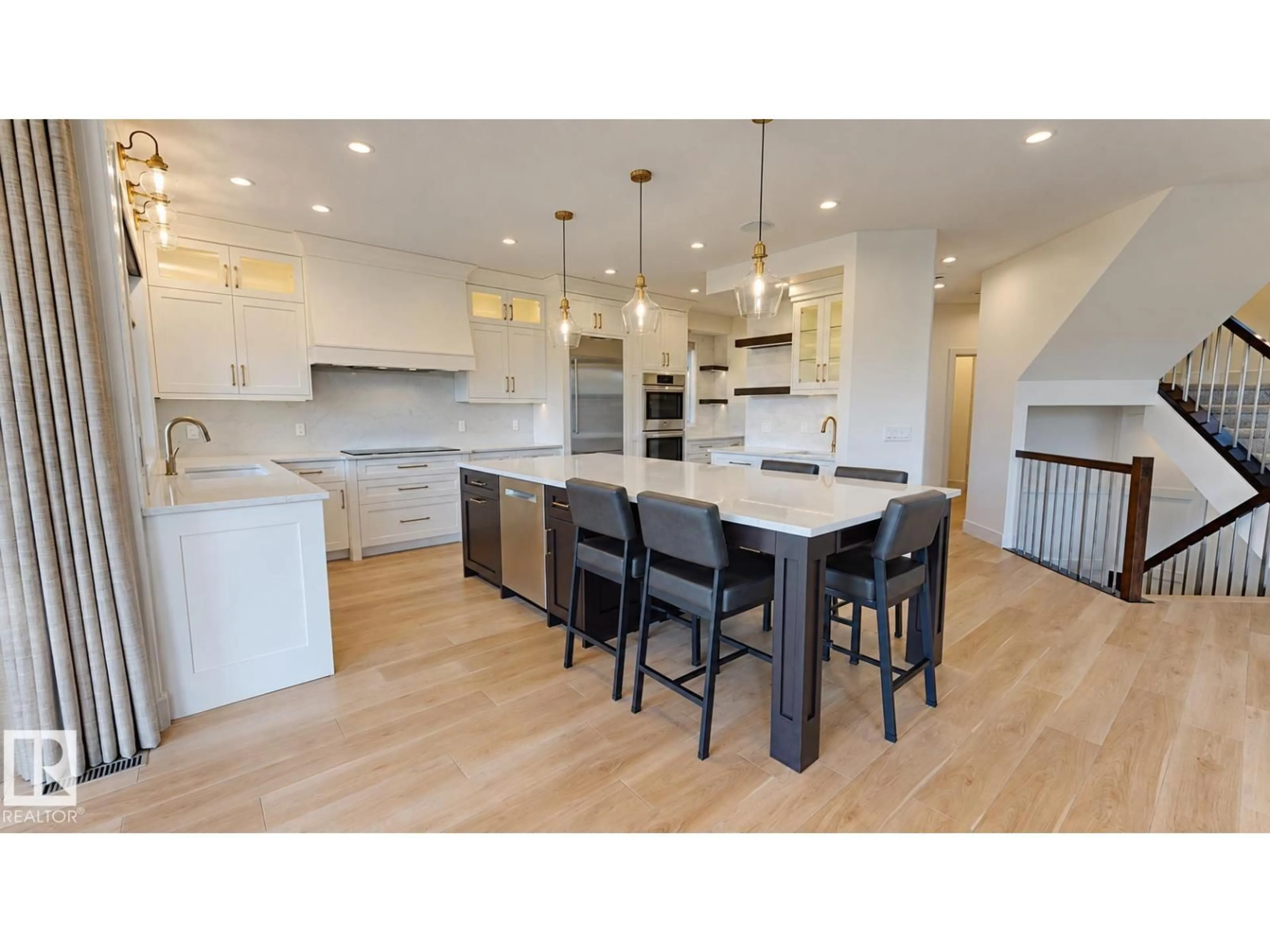 Open concept kitchen, wood/laminate floor for 26 EXECUTIVE WAY, St. Albert Alberta T8N4G6