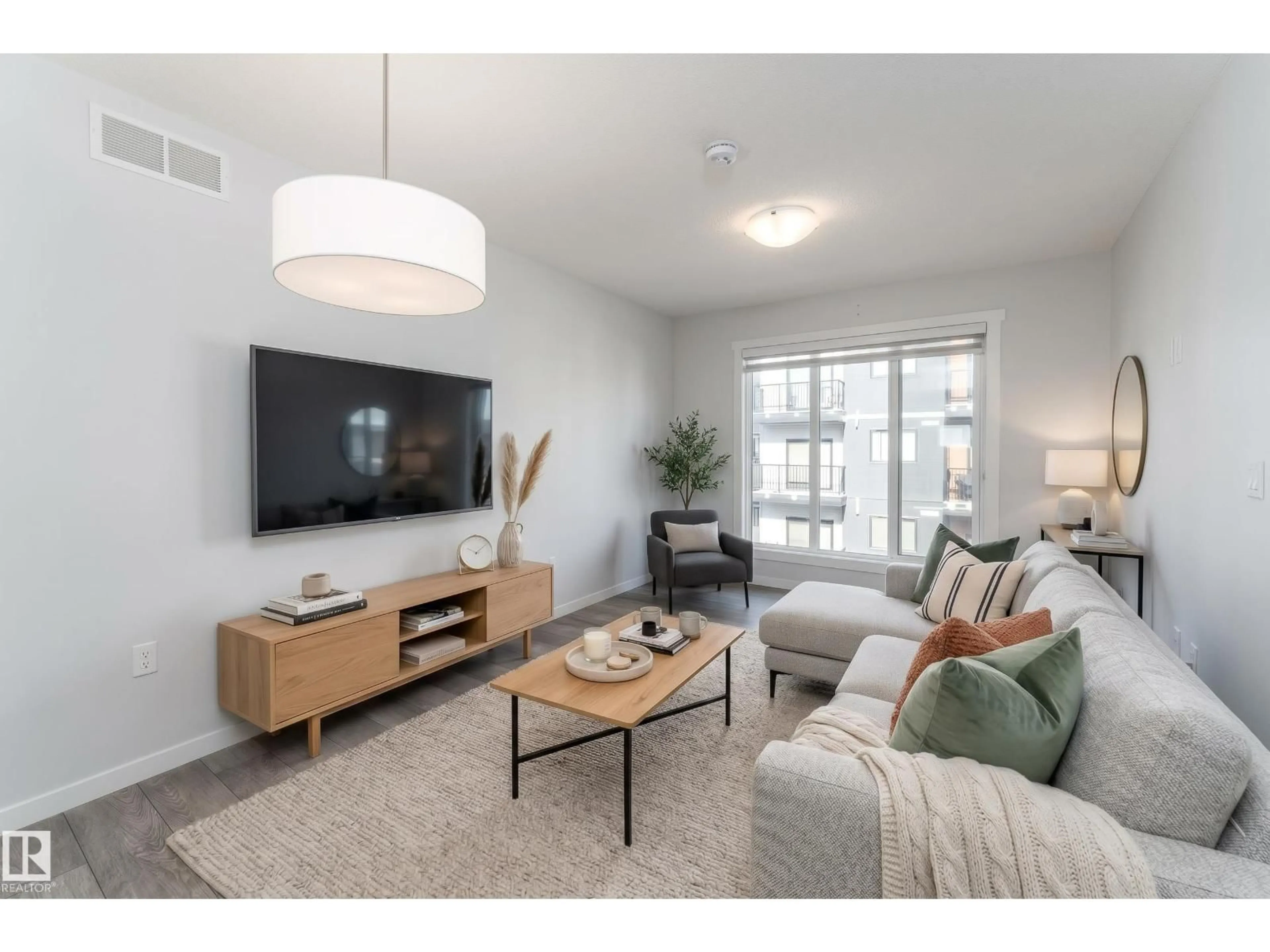Living room with furniture, unknown for #40 - 850 SECORD BV, Edmonton Alberta T5T7R9
