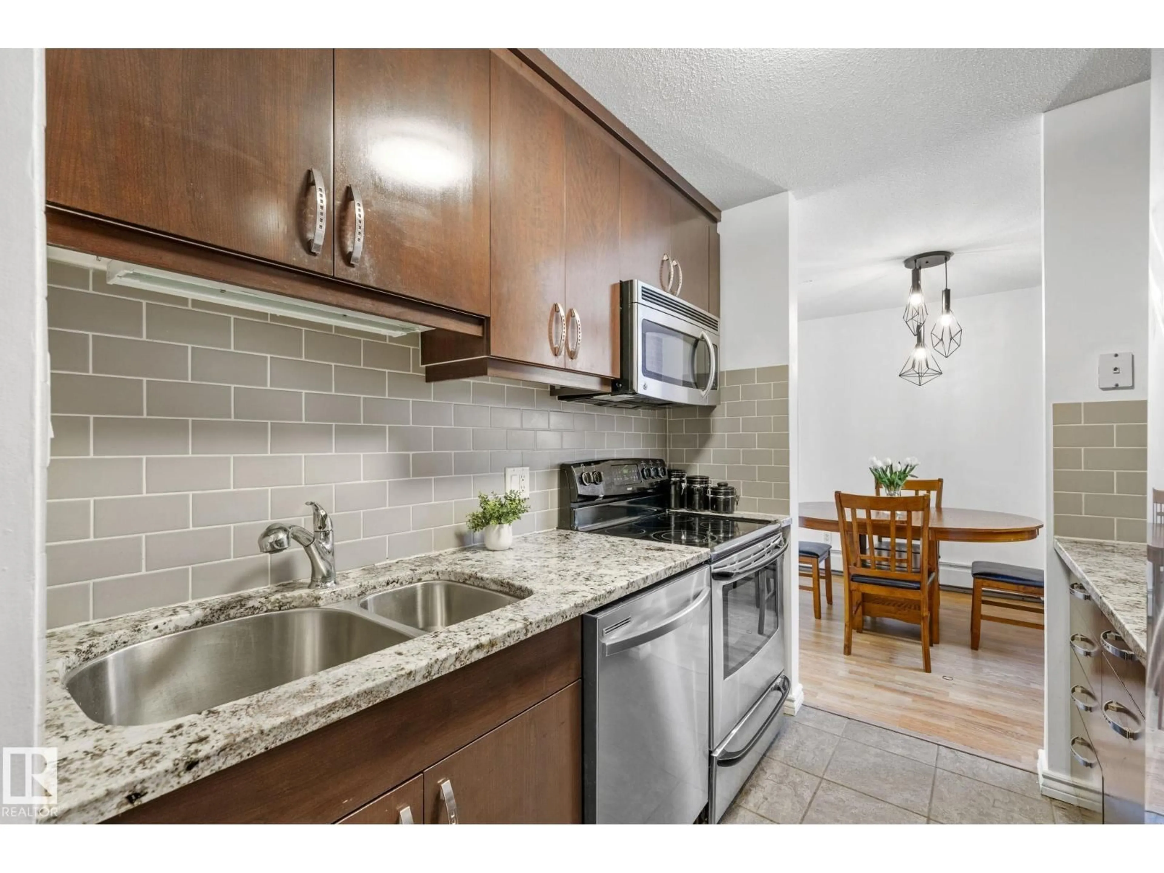 Standard kitchen, ceramic/tile floor for 105 - 11011 86 AV, Edmonton Alberta T6G0X1