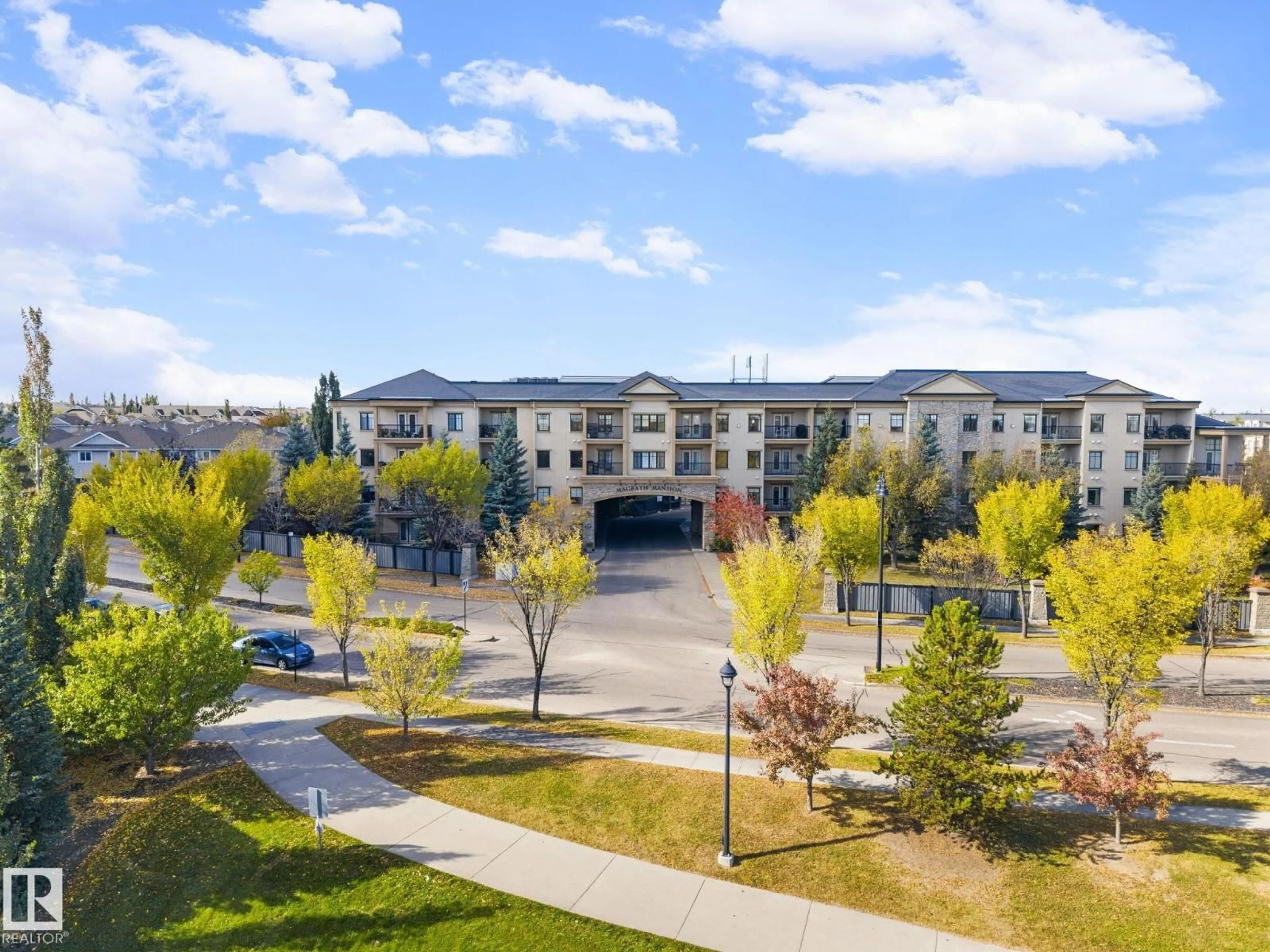 A pic from outside/outdoor area/front of a property/back of a property/a pic from drone, mountain view for 160 - 332 MAGRATH RD, Edmonton Alberta T6R3T7