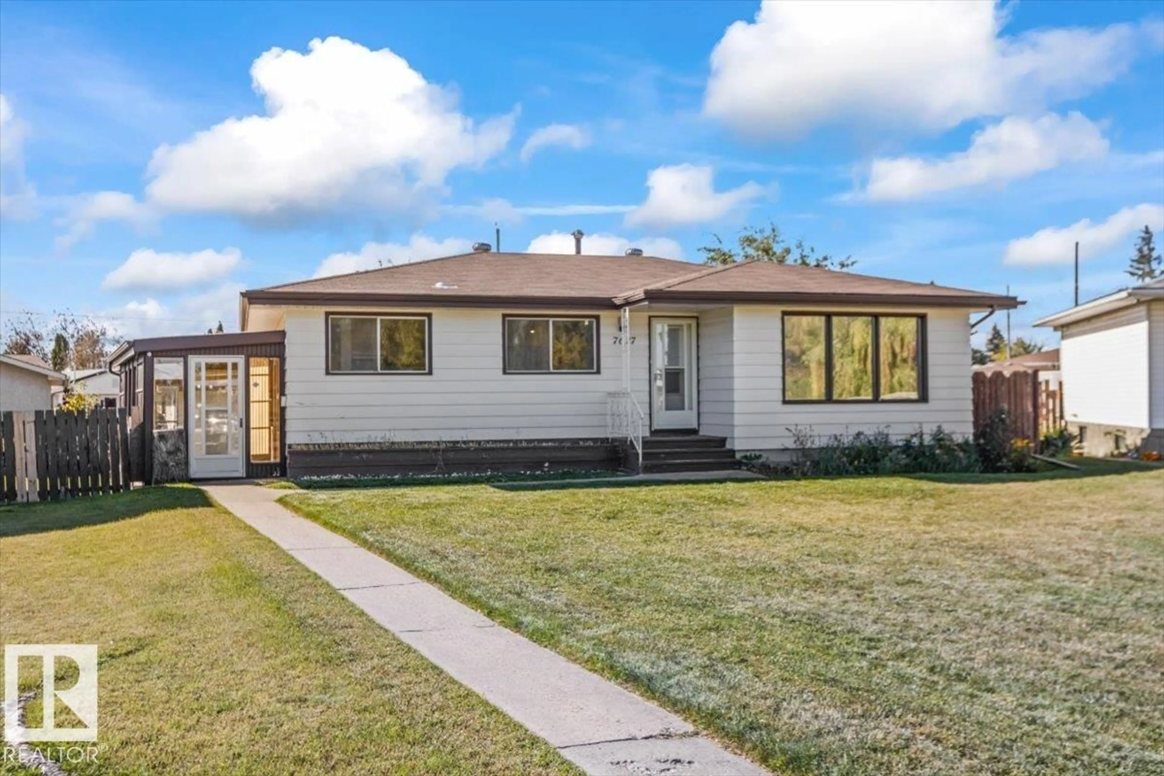 Home with vinyl exterior material, street for 7627 128A AV, Edmonton Alberta T5C1V1