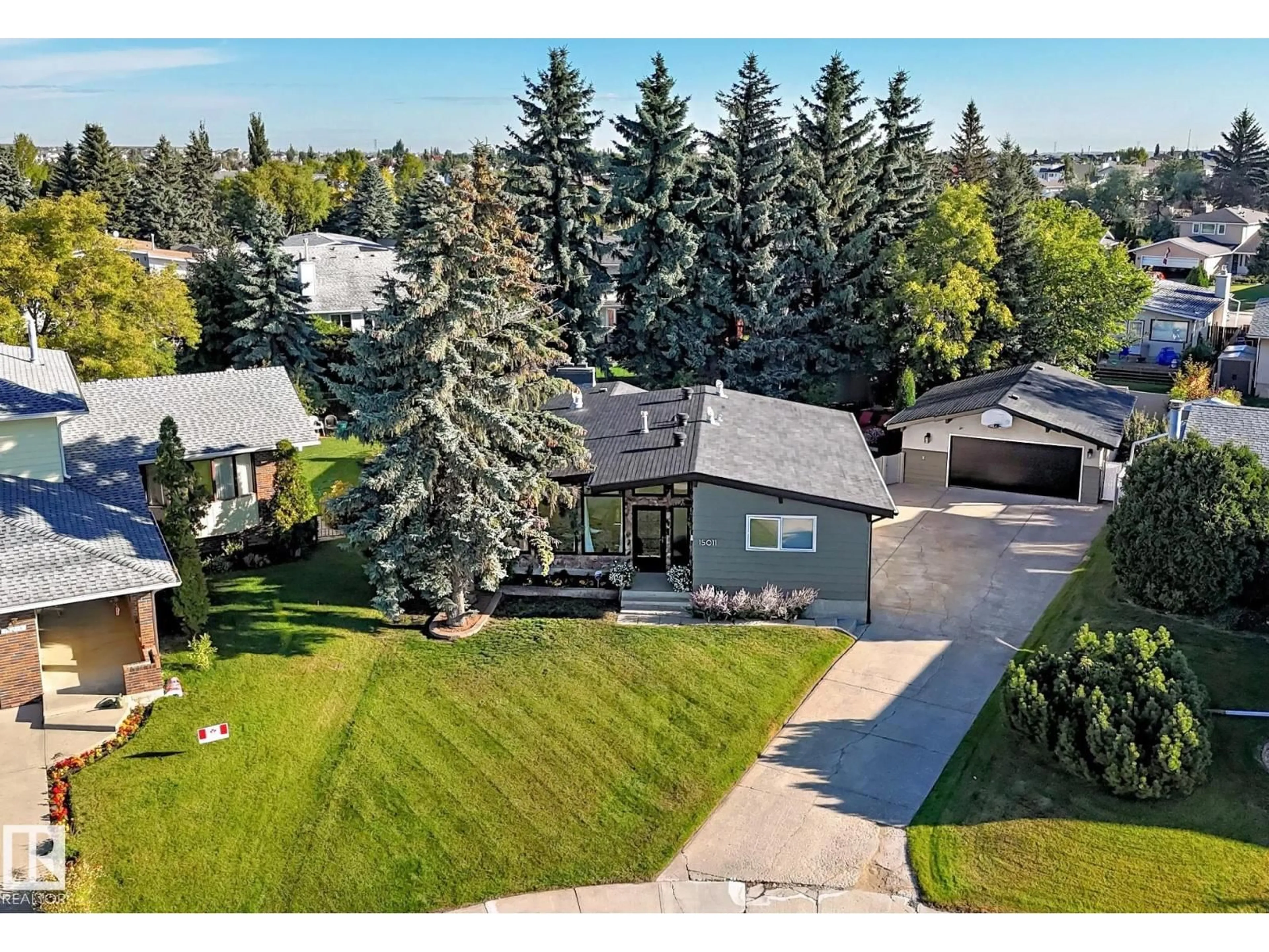 A pic from outside/outdoor area/front of a property/back of a property/a pic from drone, street for NW - 15011 55 ST, Edmonton Alberta T5A2L1