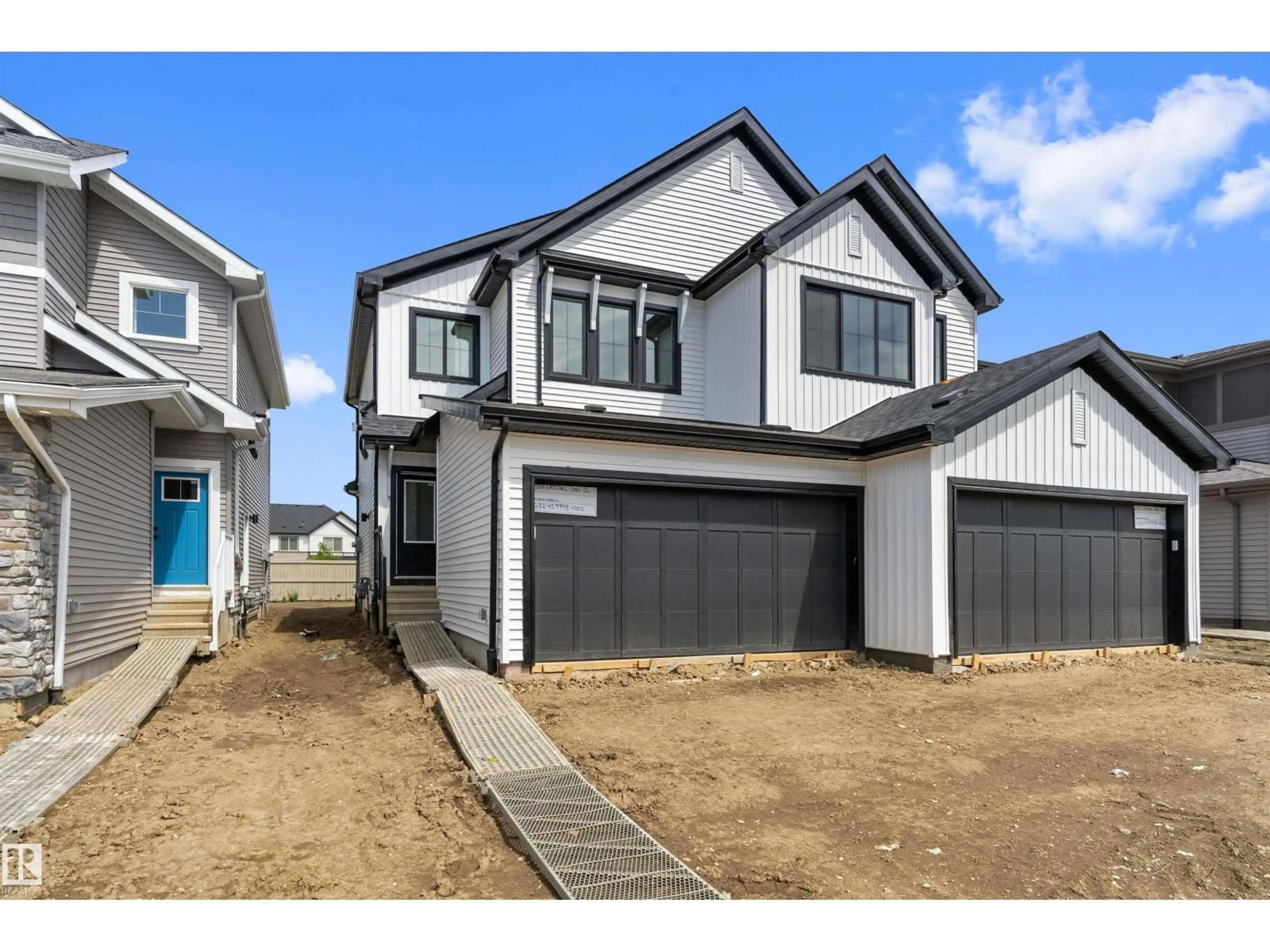 Home with vinyl exterior material, street for 1054 CRISTALL CR, Edmonton Alberta T6W5S6