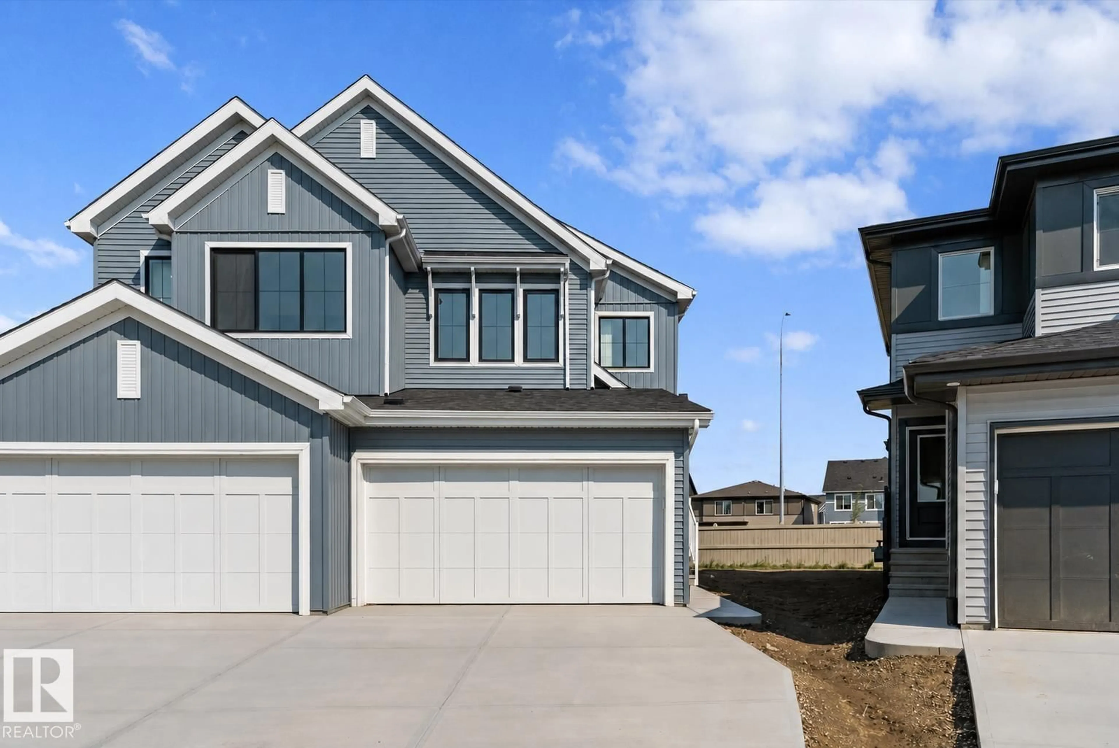 Home with vinyl exterior material, water/lake/river/ocean view for 1064 CRISTALL CR, Edmonton Alberta T6W5S6