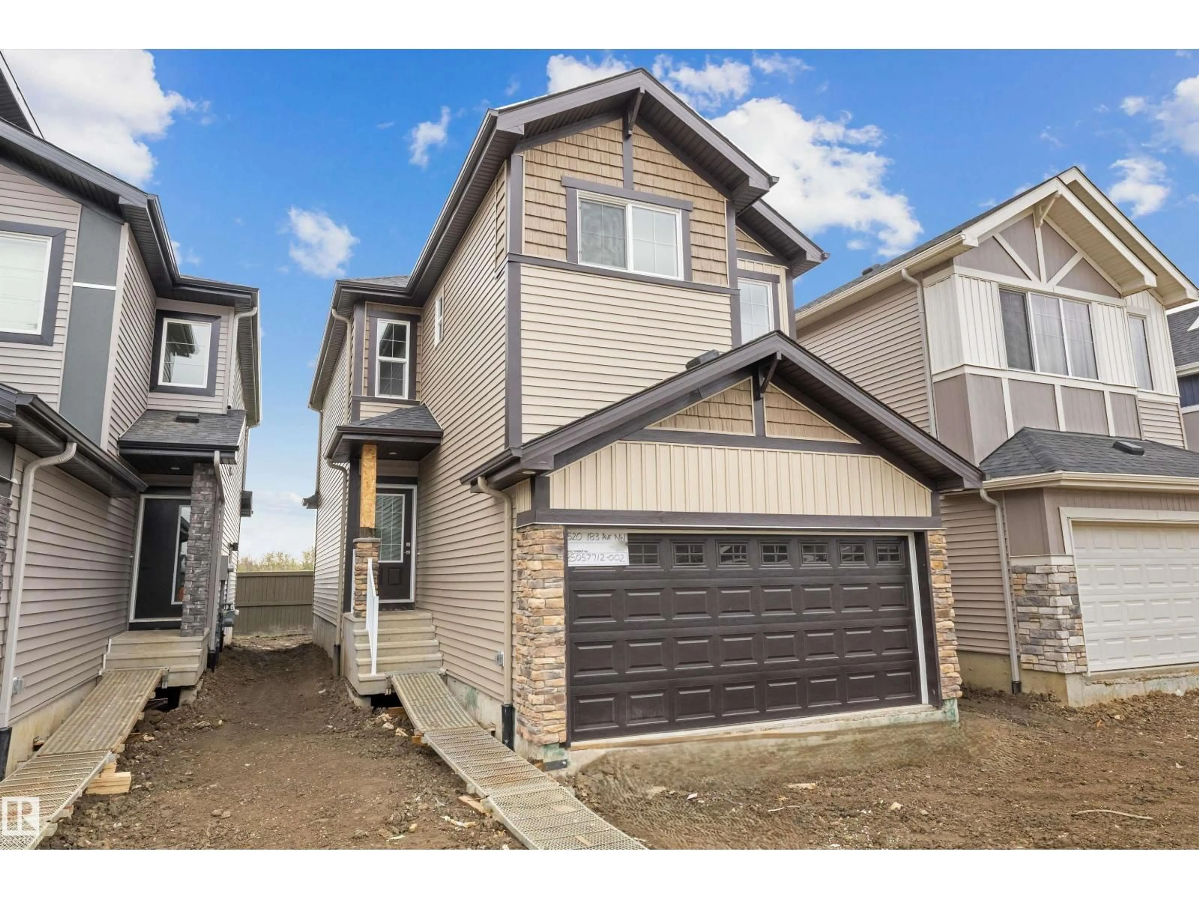 Home with vinyl exterior material, street for 8520 183 AV, Edmonton Alberta T5Z0X5