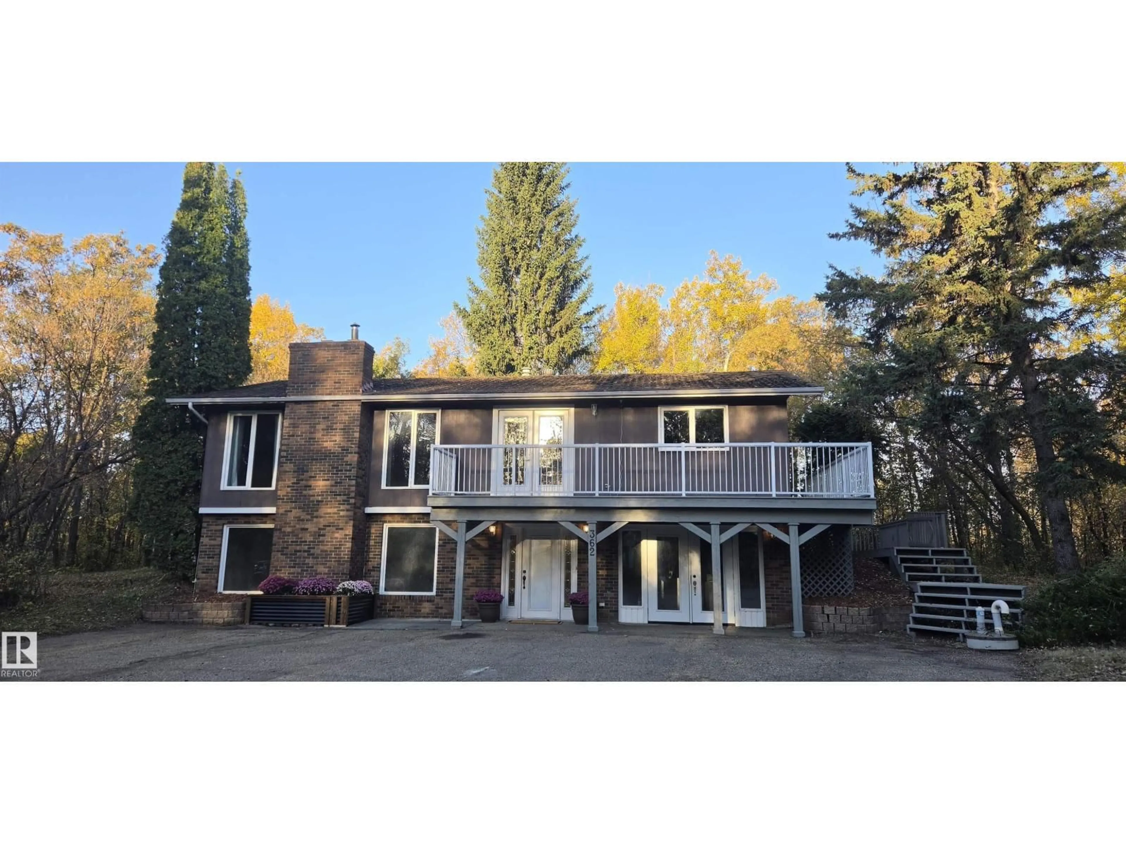 A pic from outside/outdoor area/front of a property/back of a property/a pic from drone, unknown for 362 52246 RR 232 RD, Rural Strathcona County Alberta T8B1C1