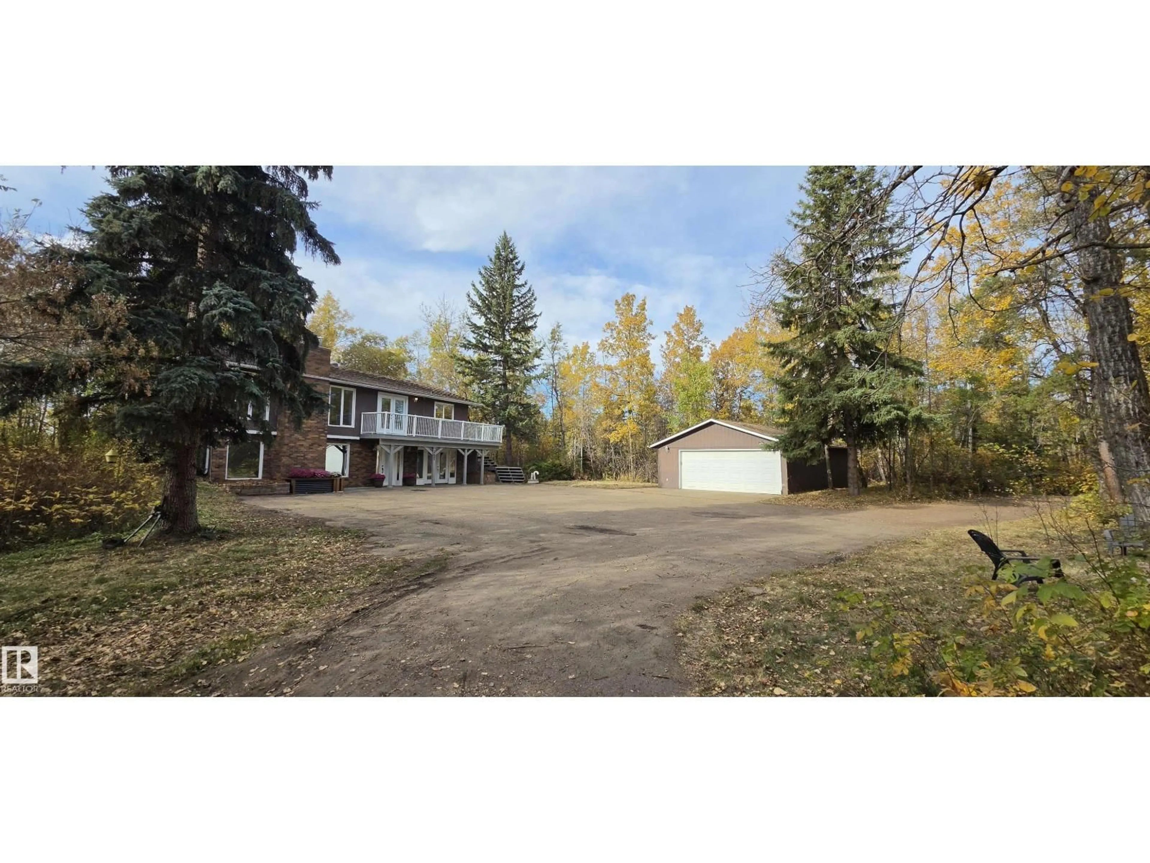 A pic from outside/outdoor area/front of a property/back of a property/a pic from drone, unknown for 362 52246 RR 232 RD, Rural Strathcona County Alberta T8B1C1