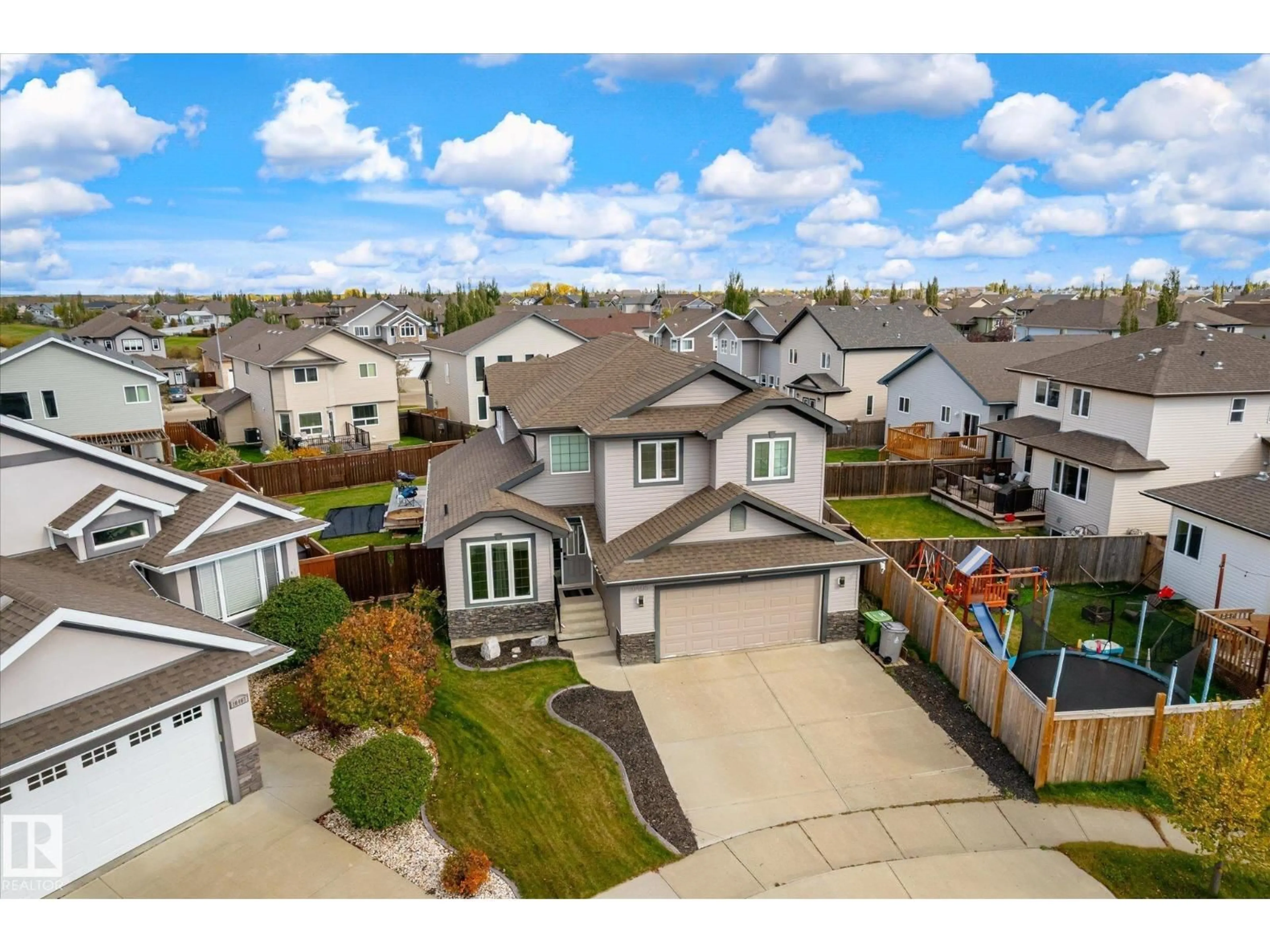 A pic from outside/outdoor area/front of a property/back of a property/a pic from drone, street for 10405 98 ST, Morinville Alberta T8R0B7