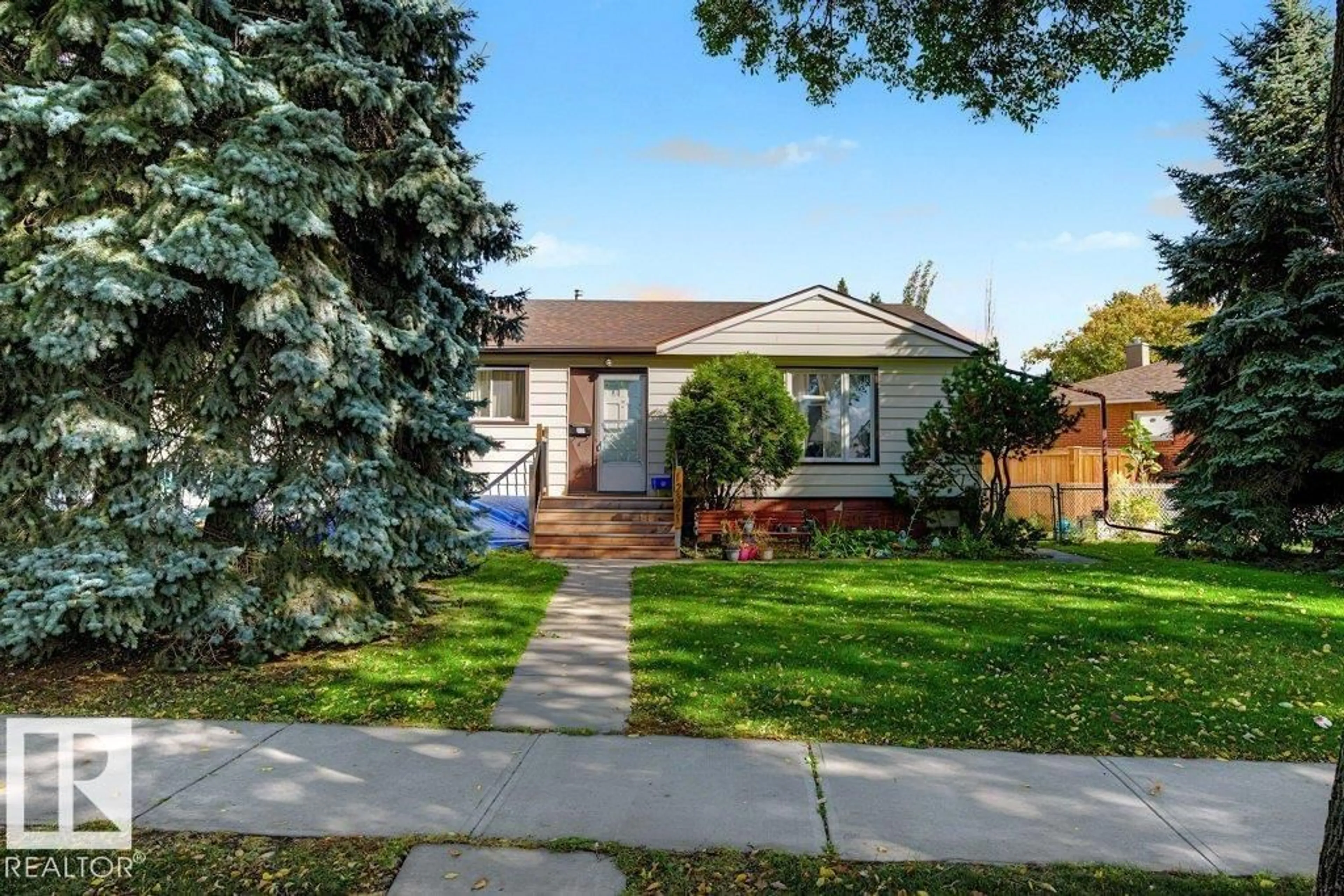 Home with vinyl exterior material, street for NW - 12391 132 ST, Edmonton Alberta T5L1P9