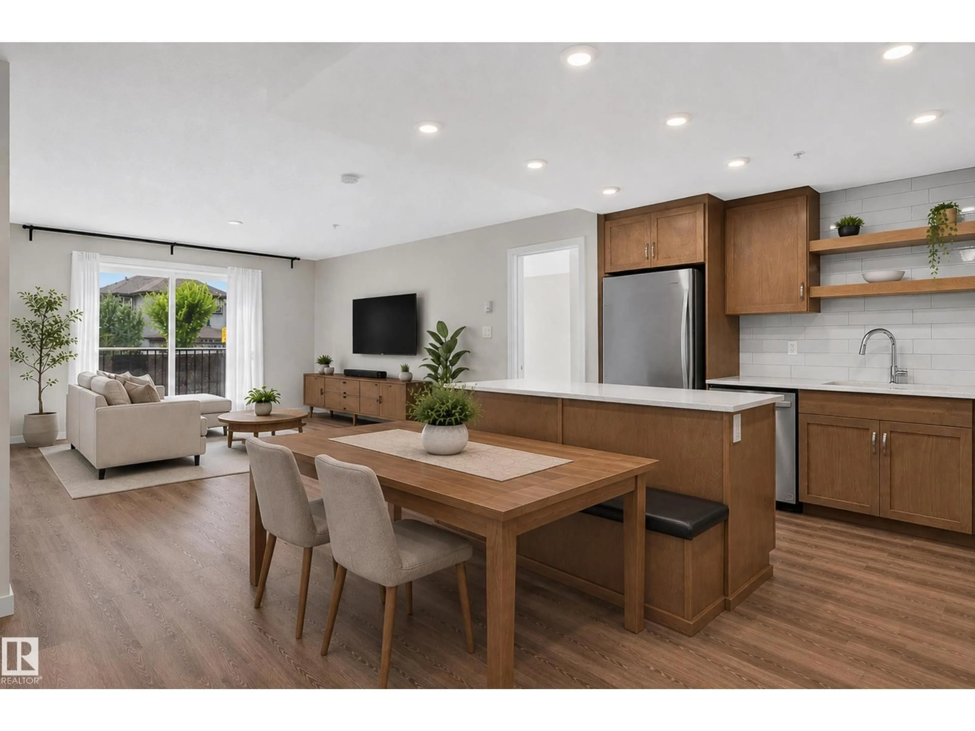 Open concept kitchen, wood/laminate floor for 5504 - 131 SCHONSEE DR, Edmonton Alberta T5Z0N9