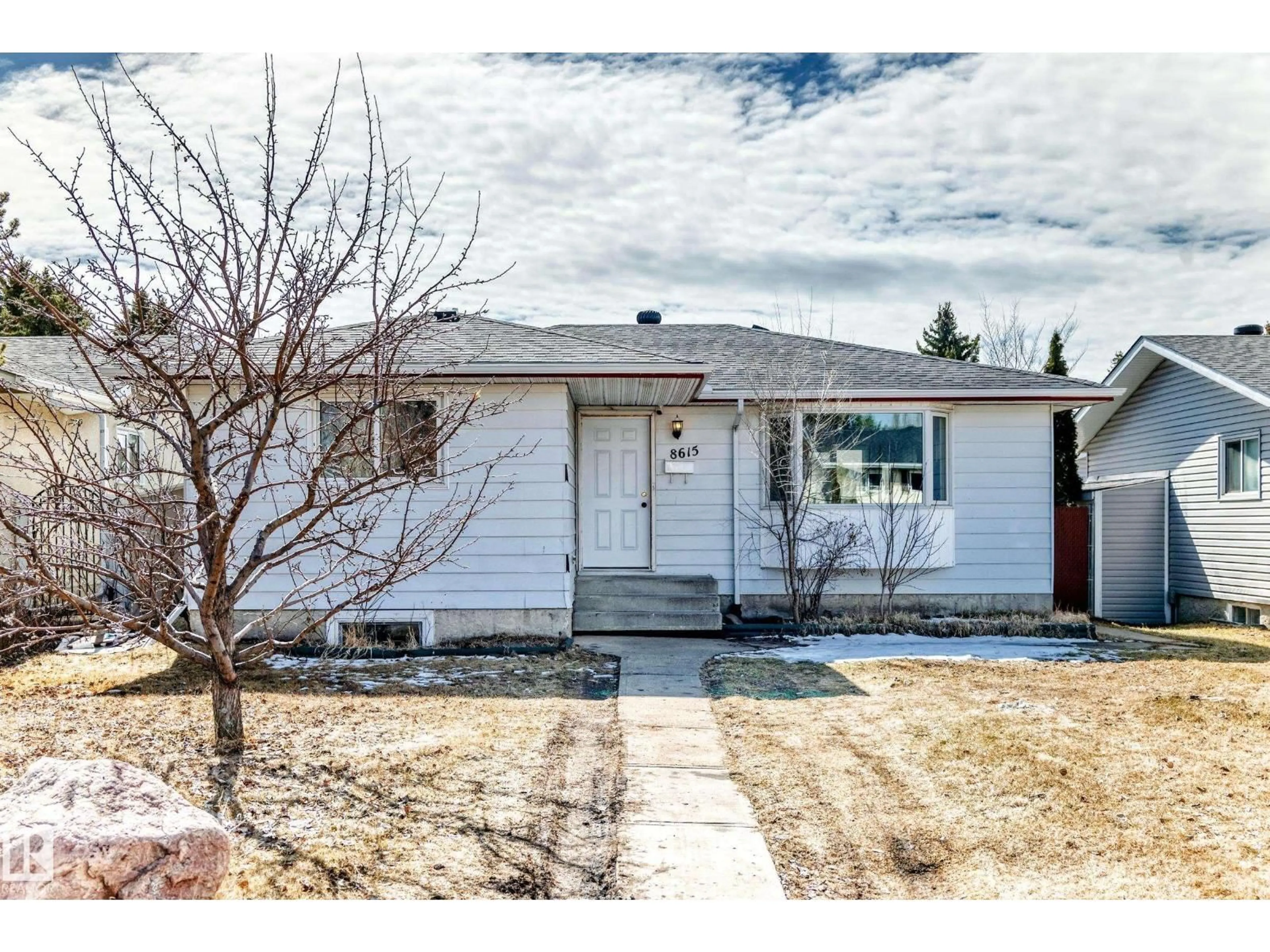 Home with vinyl exterior material, street for 8615 42A AV, Edmonton Alberta T6K1E6