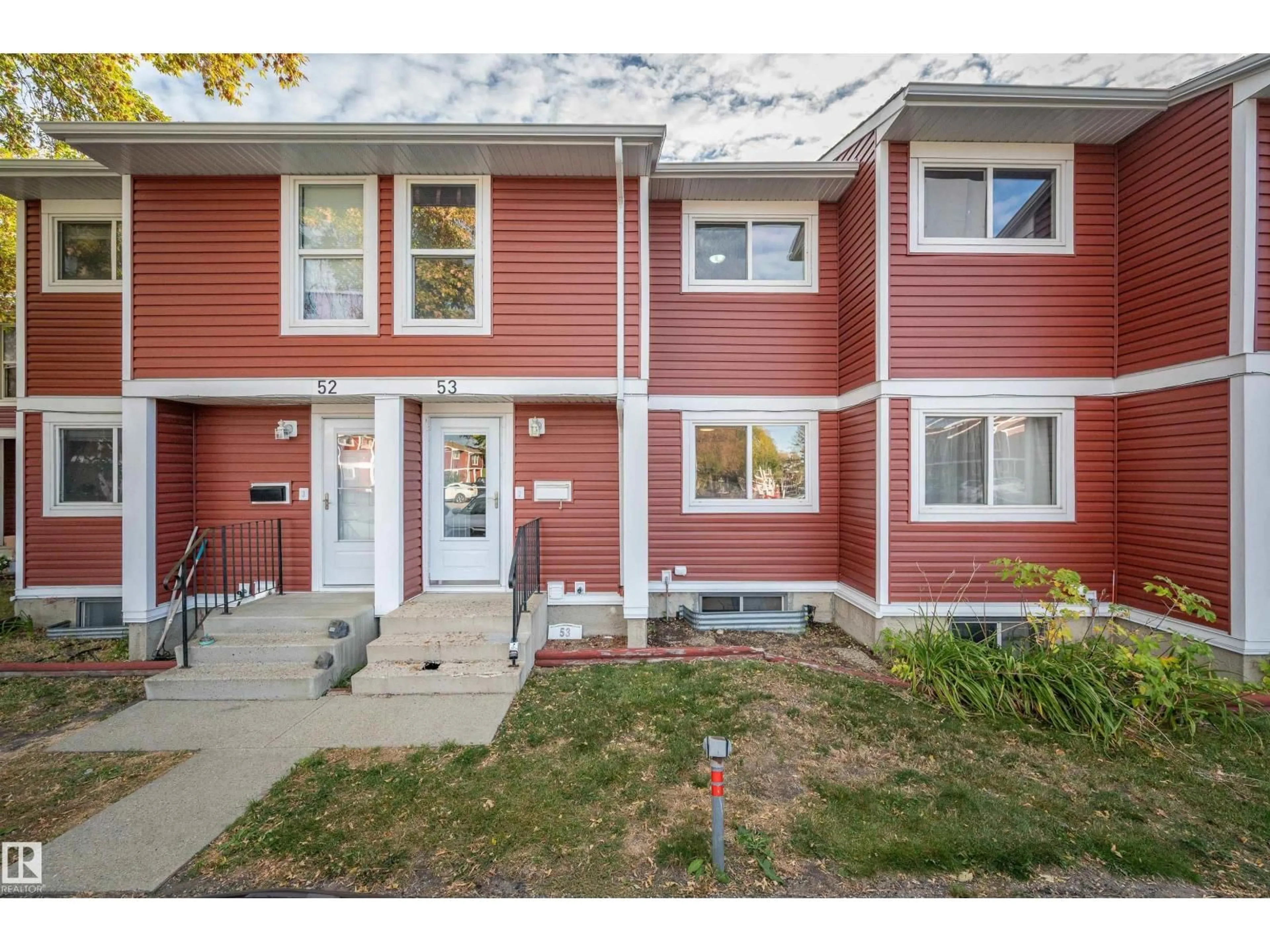 Home with vinyl exterior material, street for 53 - 4707 126 AV, Edmonton Alberta T5A4K4