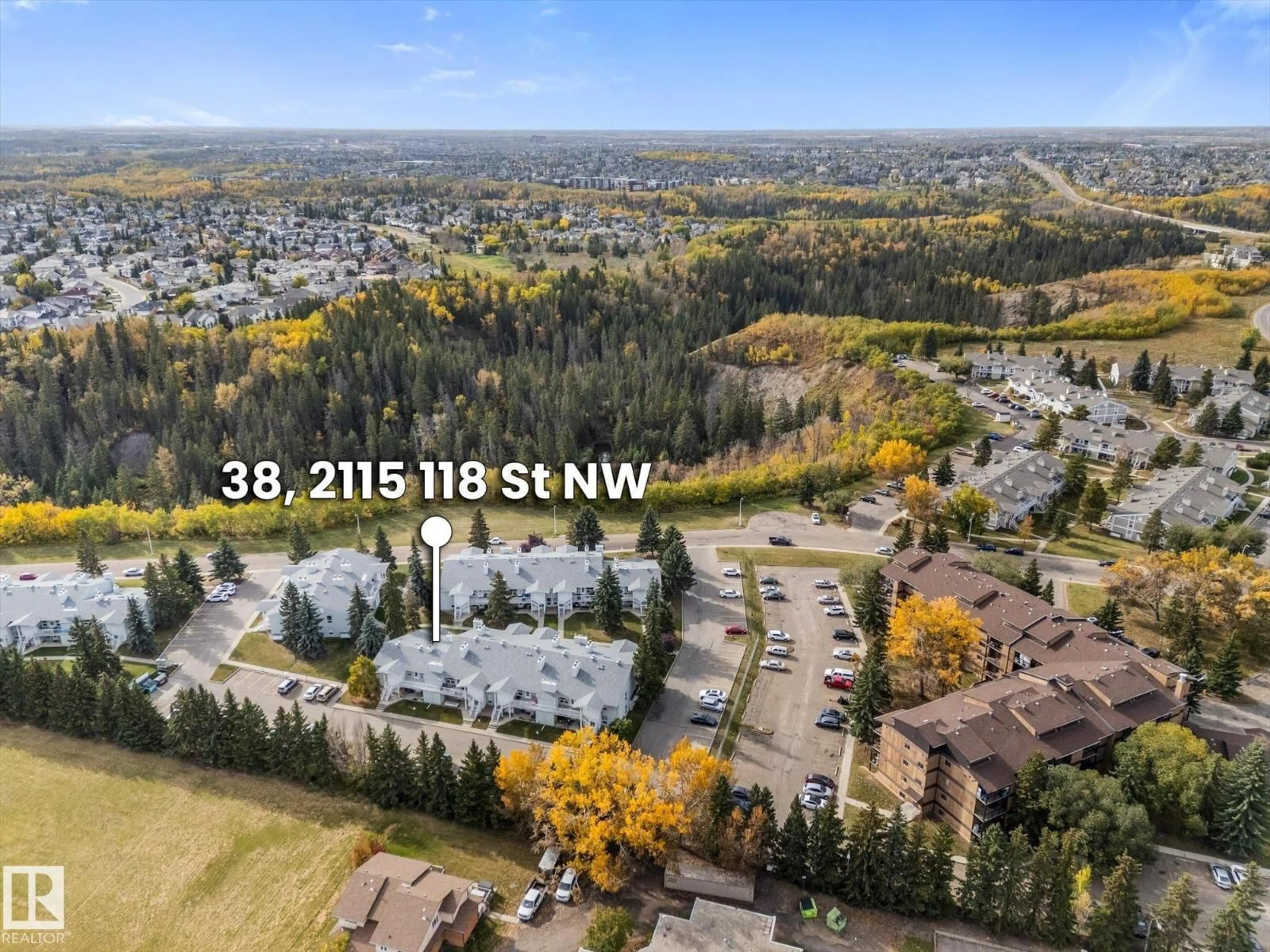 A pic from outside/outdoor area/front of a property/back of a property/a pic from drone, forest/trees view for #38 - 2115 118 ST, Edmonton Alberta T6J5N1