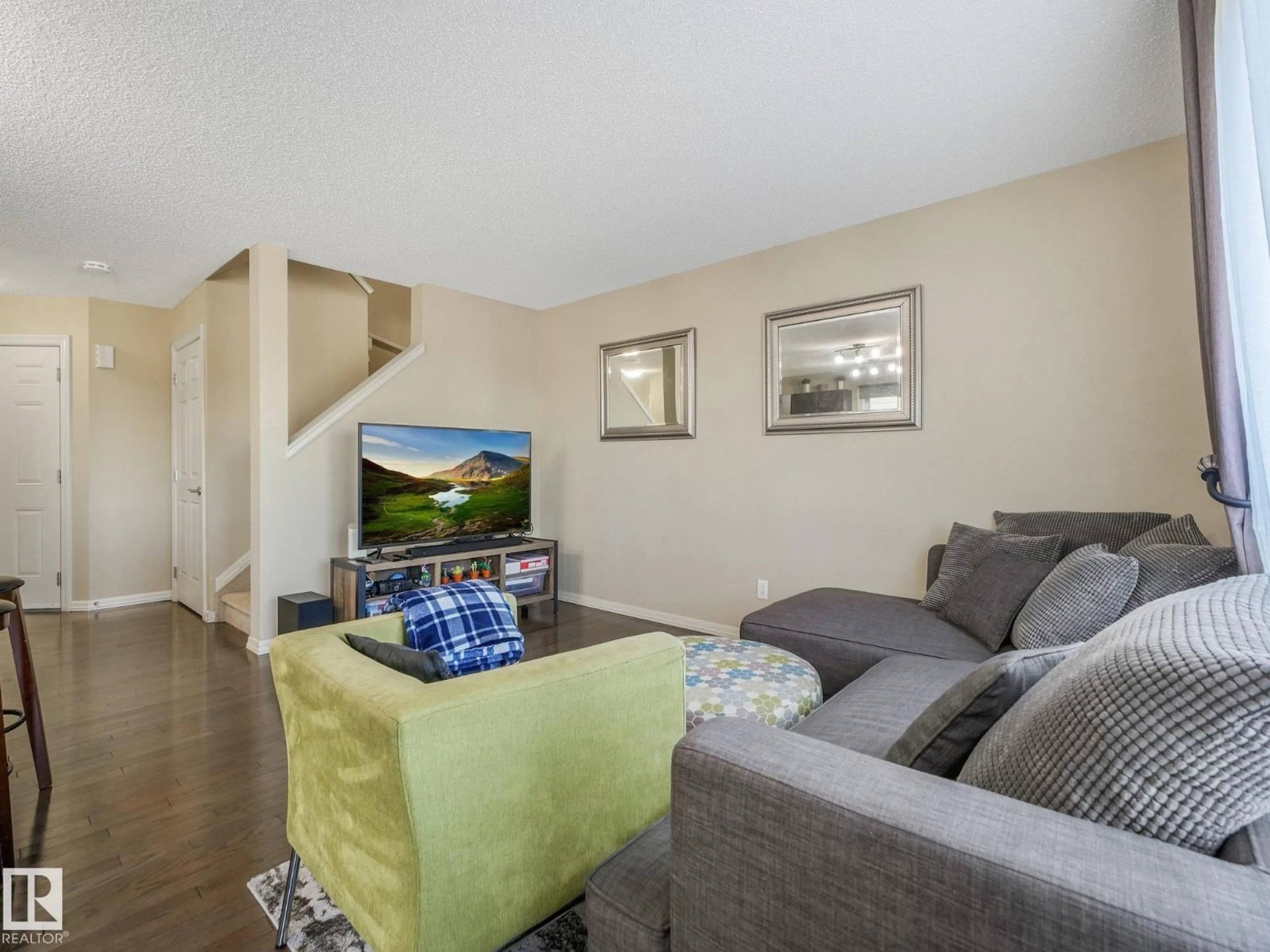 Living room with furniture, unknown for SW - 5220 1A AV, Edmonton Alberta T6X0X1