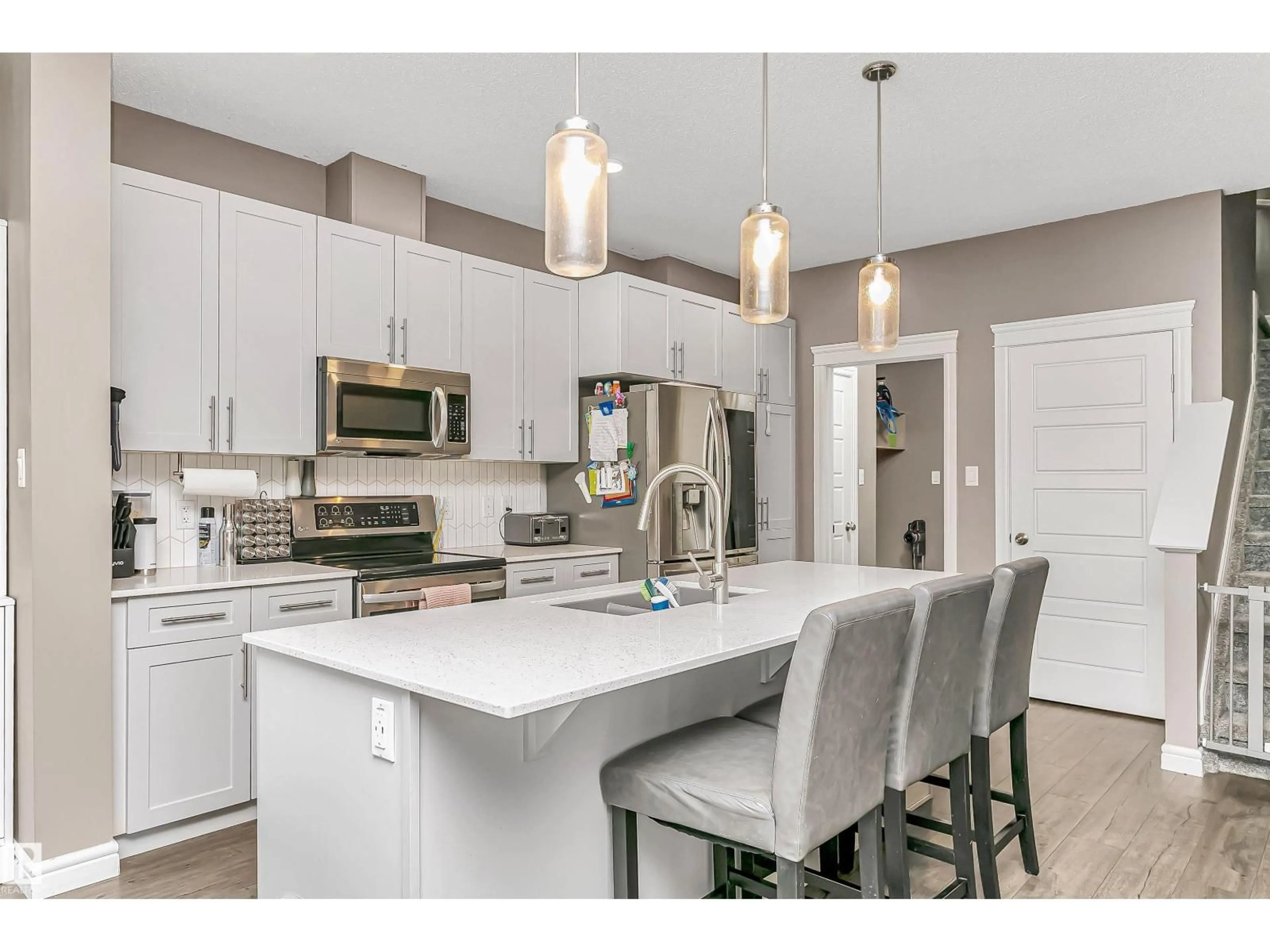 Open concept kitchen, ceramic/tile floor for 32 JUNEAU WY, St. Albert Alberta T8N7V7