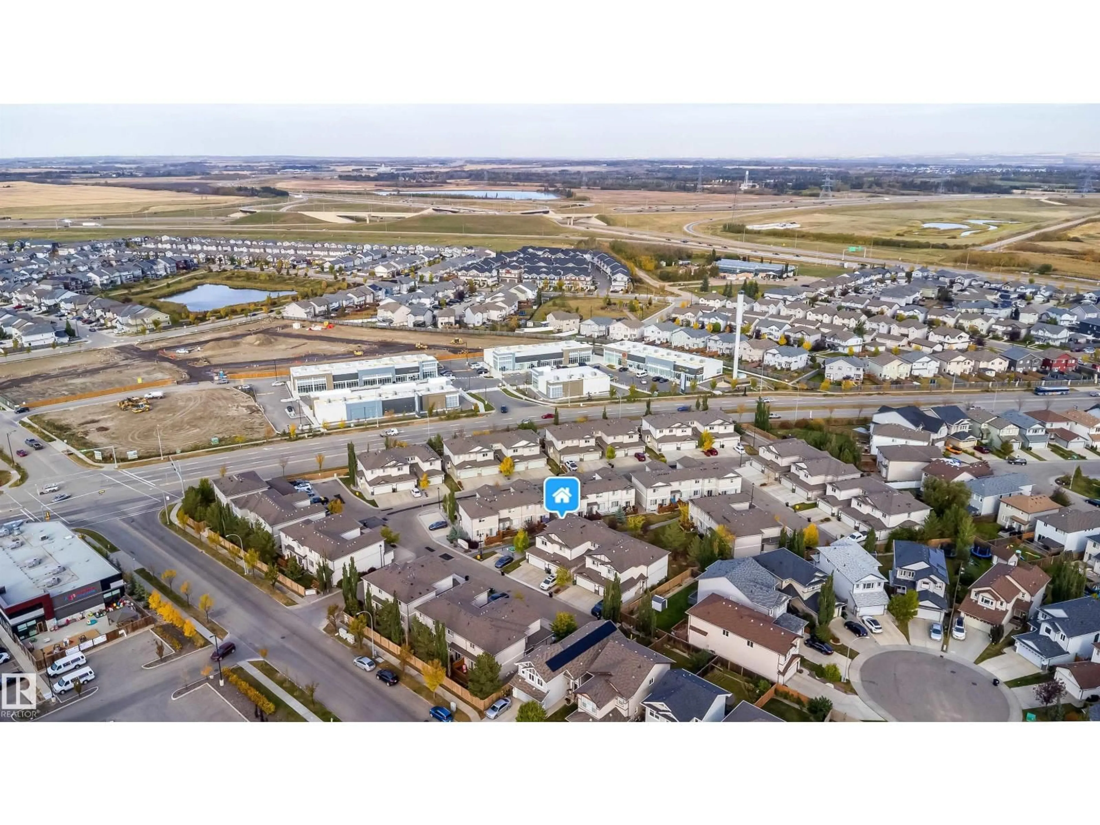 A pic from outside/outdoor area/front of a property/back of a property/a pic from drone, street for 9 - 445 BRINTNELL BV, Edmonton Alberta T5Y0V5