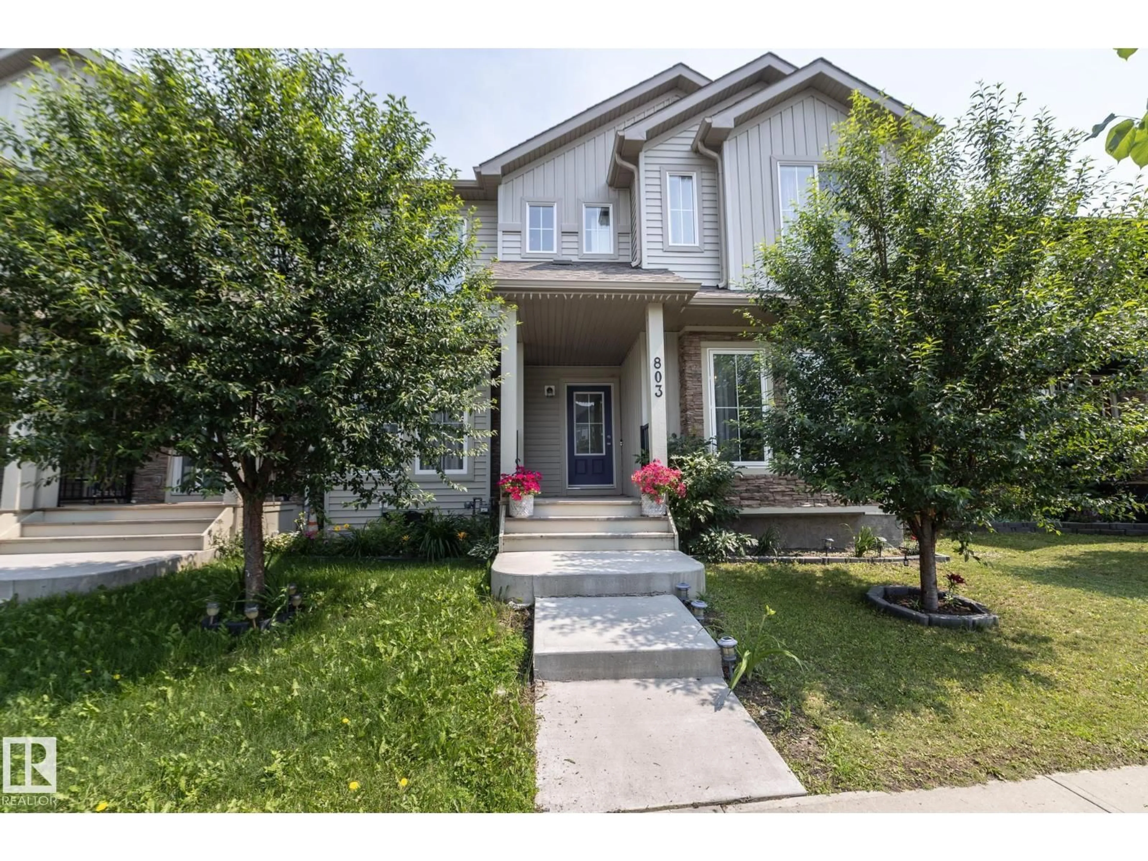 Home with vinyl exterior material, street for 803 SECORD BV, Edmonton Alberta T5T7K2