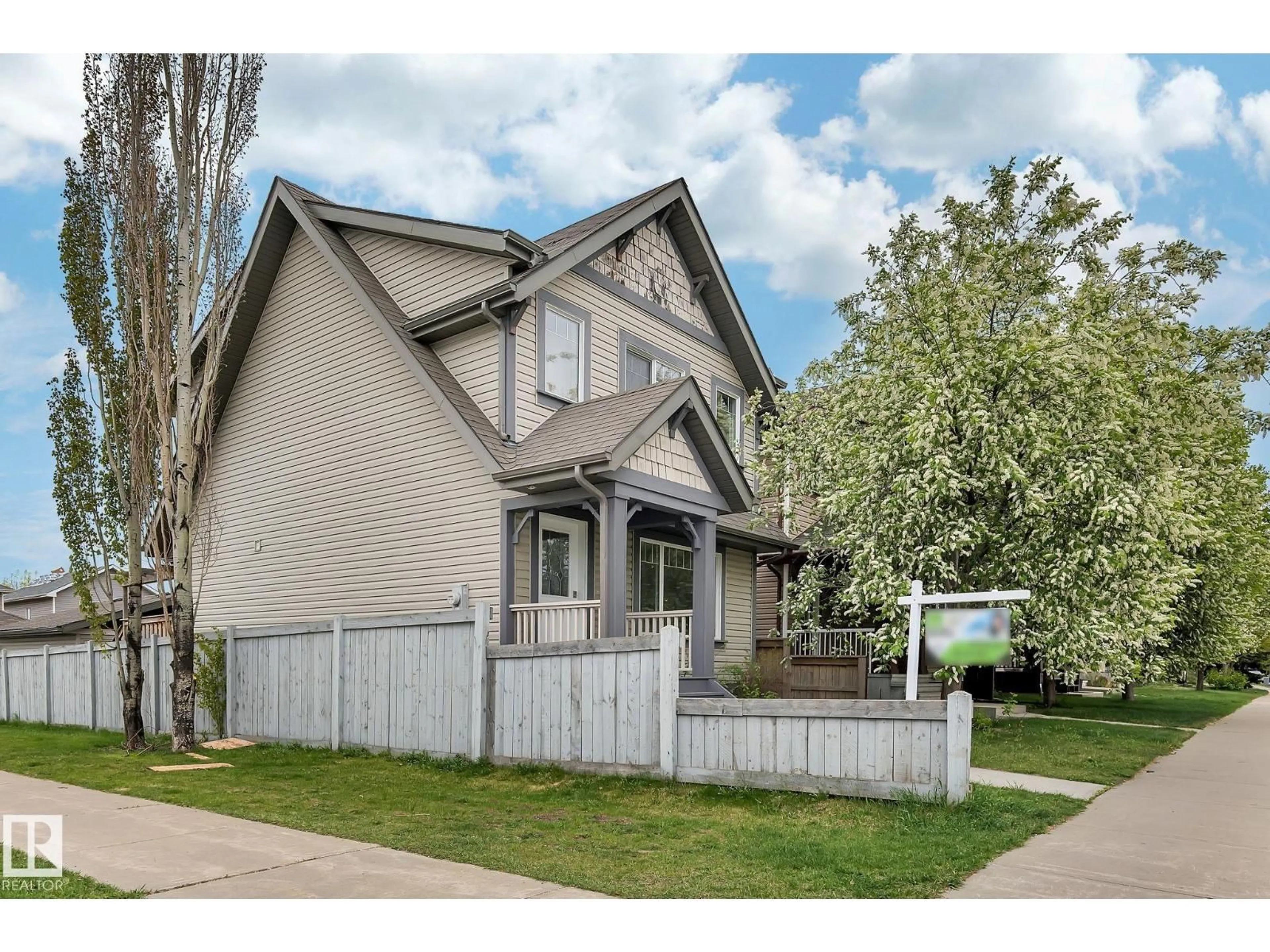 Home with vinyl exterior material, street for NW - 14771 141 ST, Edmonton Alberta T6V0A7