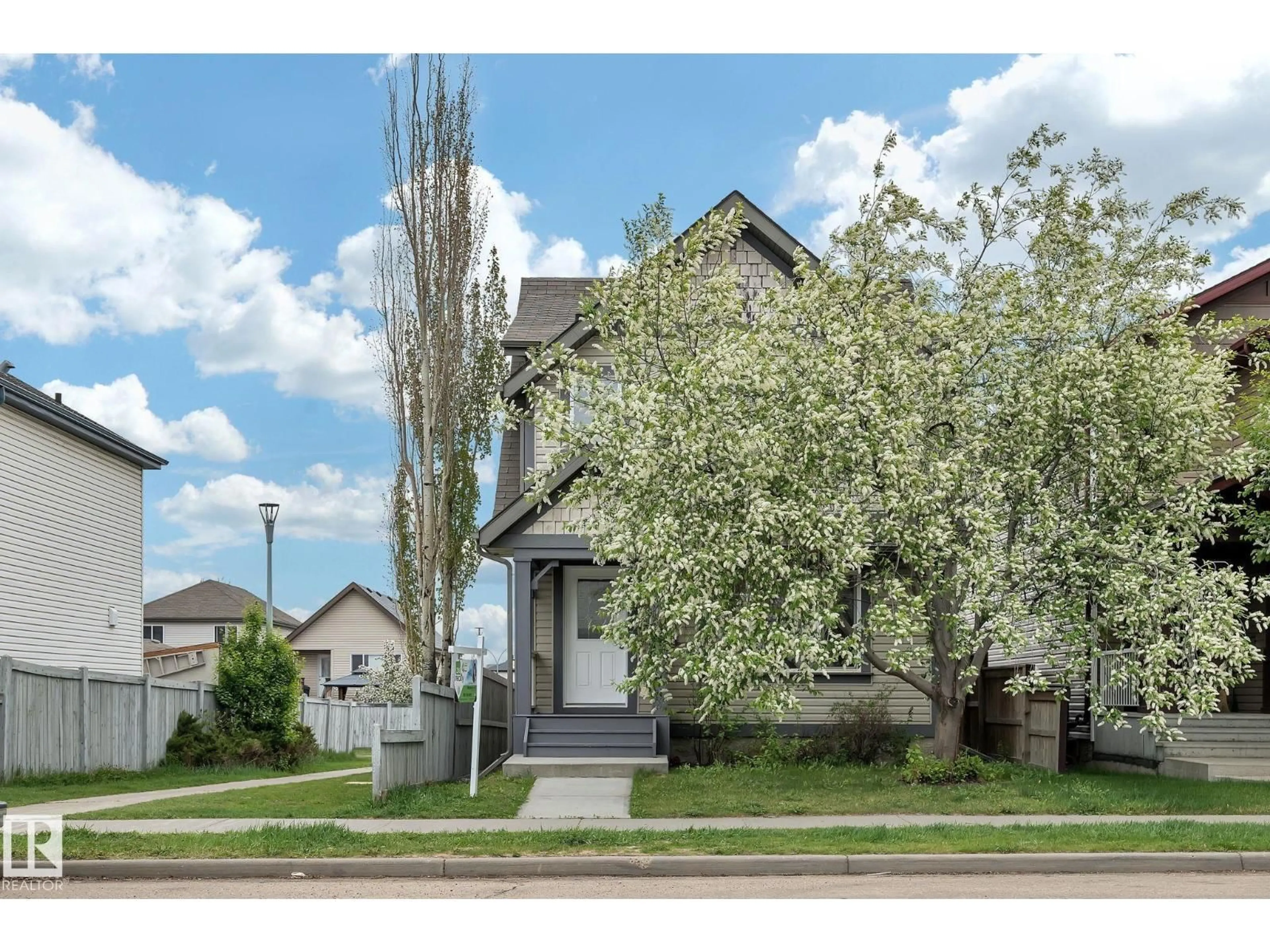 Home with vinyl exterior material, street for NW - 14771 141 ST, Edmonton Alberta T6V0A7
