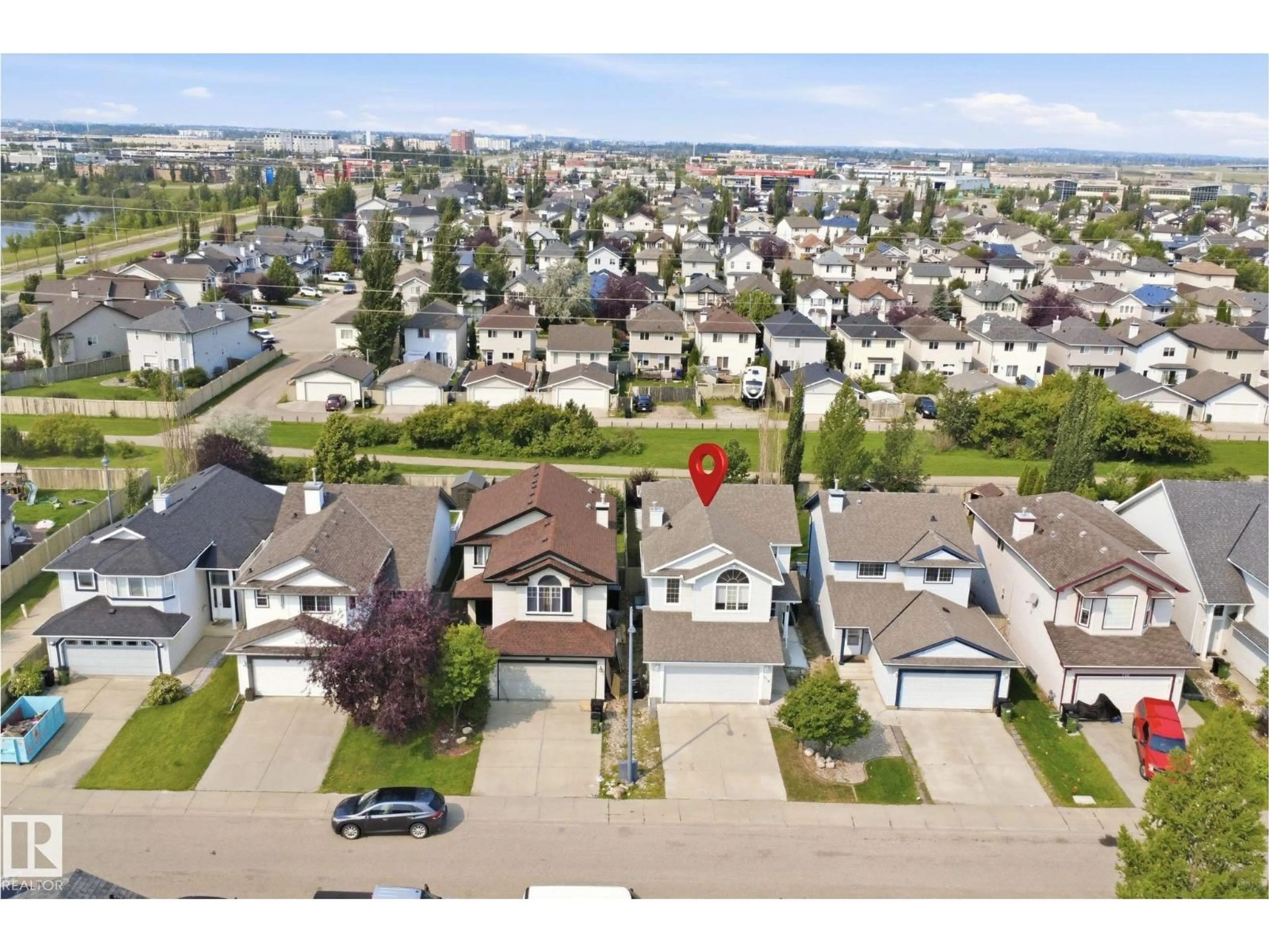 A pic from outside/outdoor area/front of a property/back of a property/a pic from drone, street for 714 87 STREET, Edmonton Alberta T6X1G6