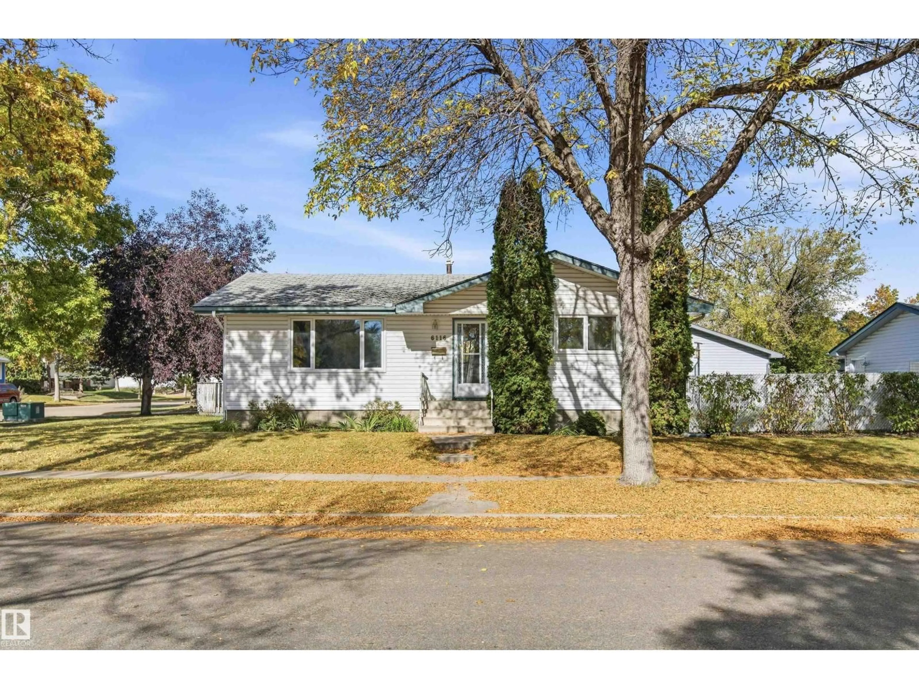 Home with vinyl exterior material, street for 6116 148 AV, Edmonton Alberta T5A1T9