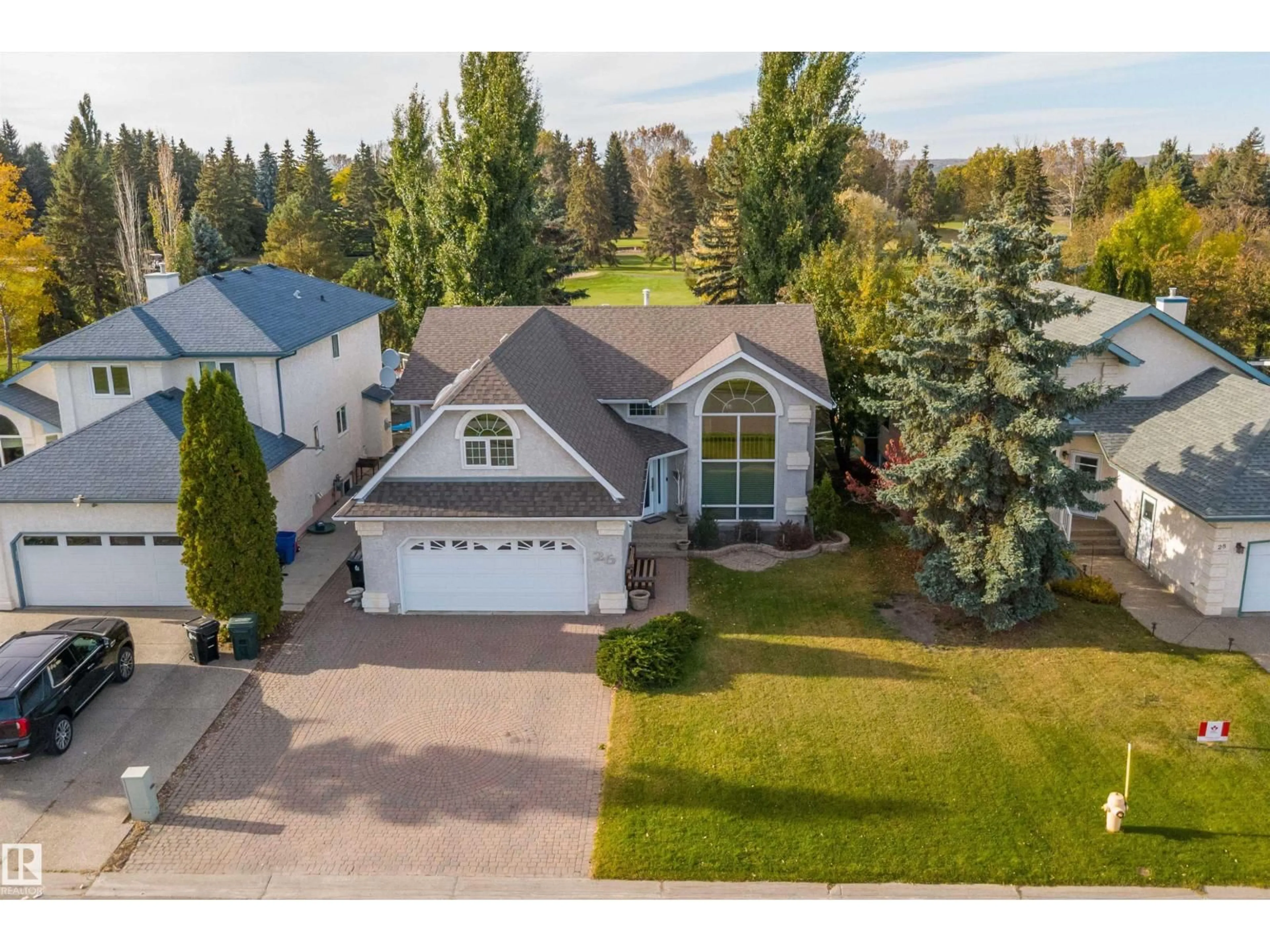 A pic from outside/outdoor area/front of a property/back of a property/a pic from drone, street for 26 FAIRWAY DR, Spruce Grove Alberta T7X3K3