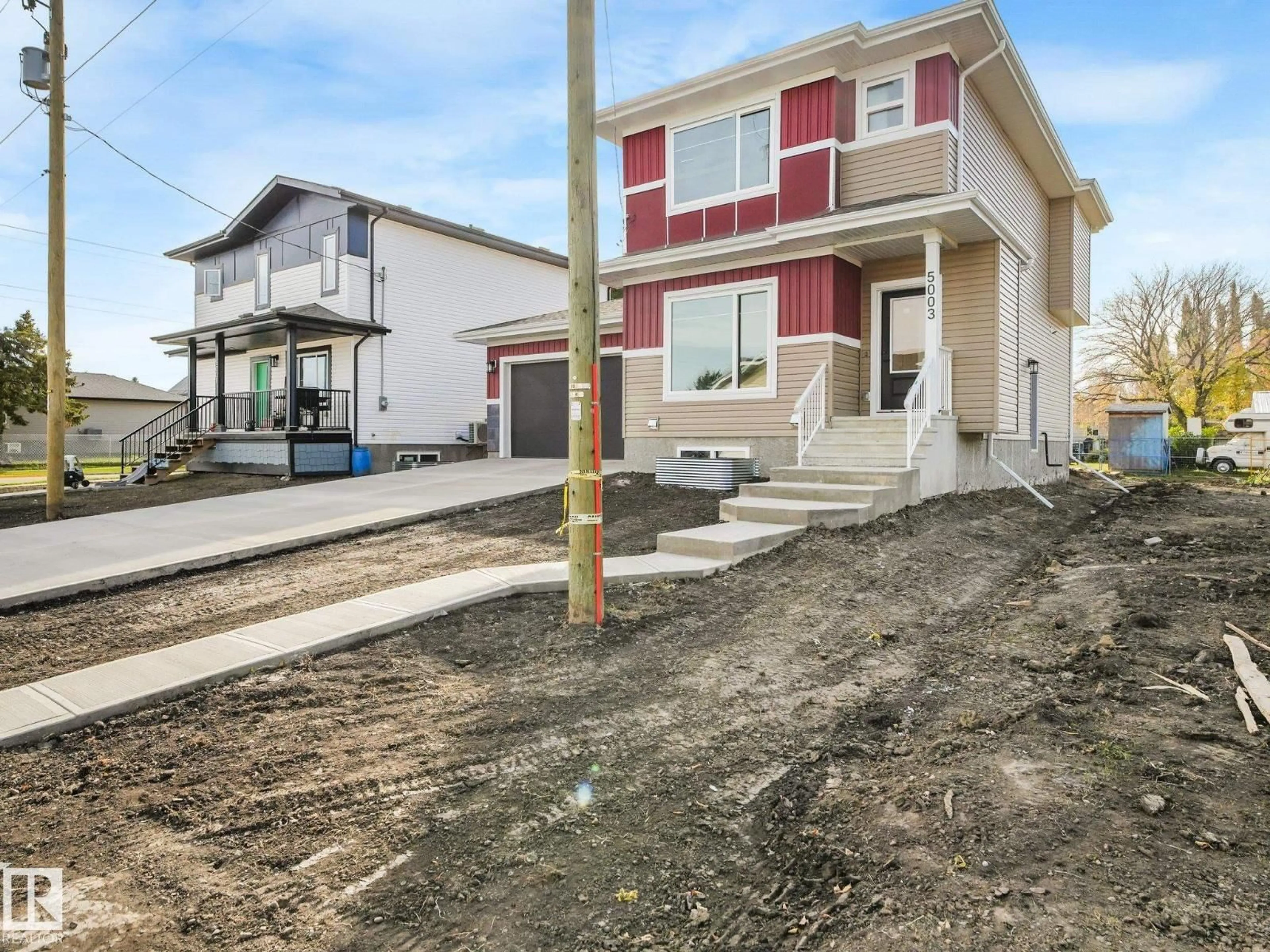 Home with vinyl exterior material, street for 5003 51 AV, Calmar Alberta T0C0V0