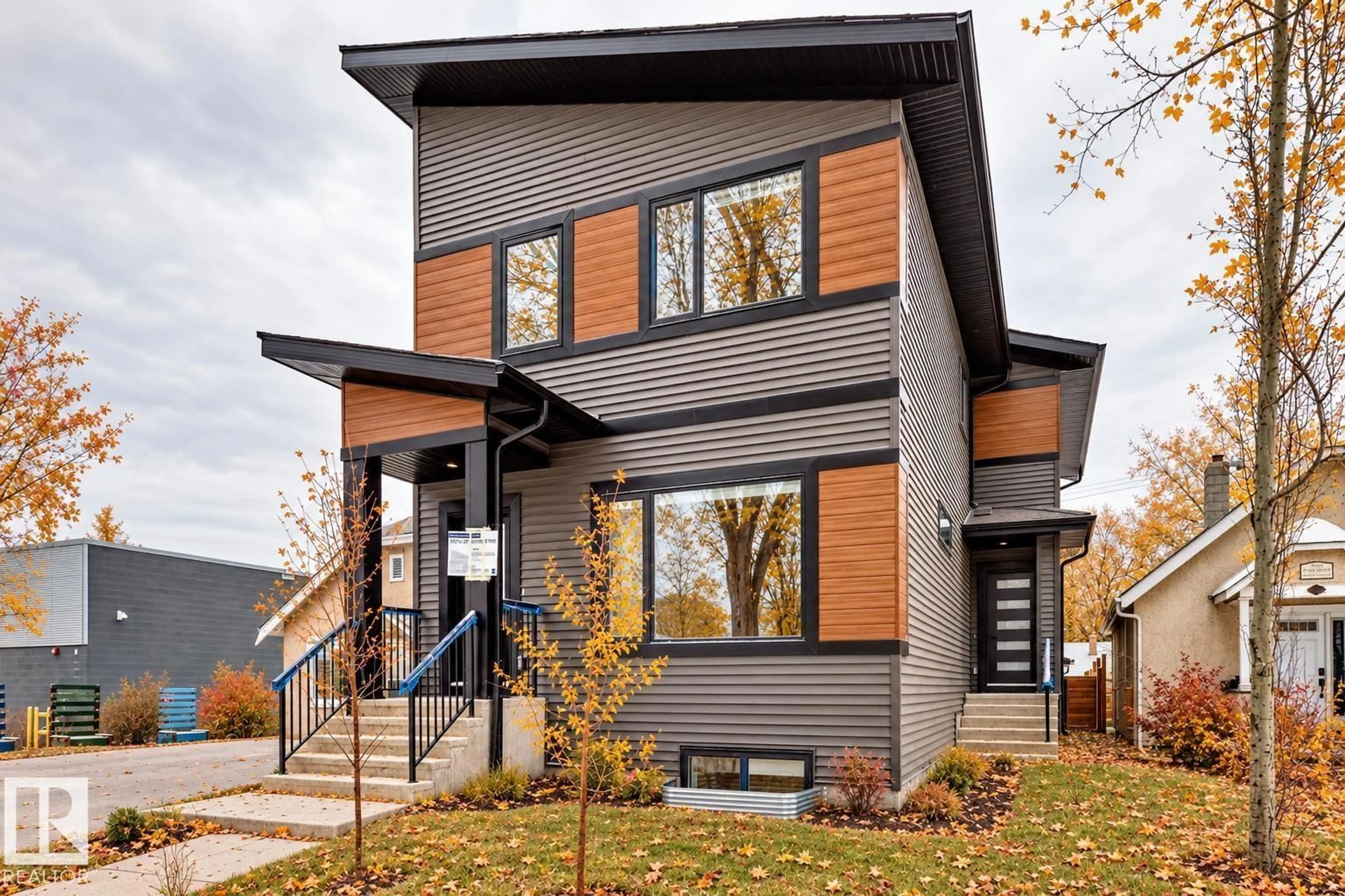 Home with brick exterior material, street for 11519 & 11521 67 ST NW, Edmonton Alberta T5B1L6