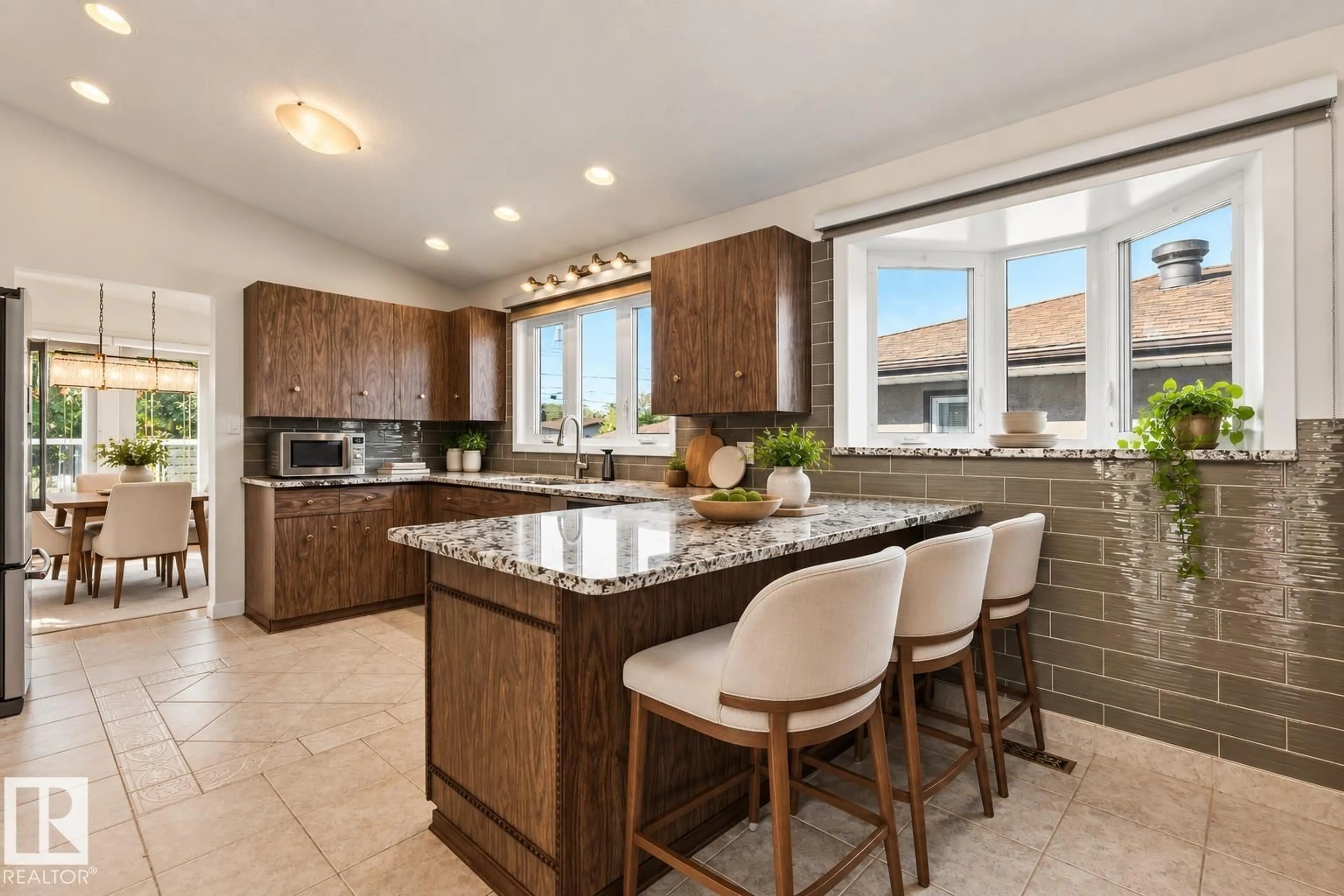 Open concept kitchen, ceramic/tile floor for 7802 132A AV, Edmonton Alberta T5C2C7