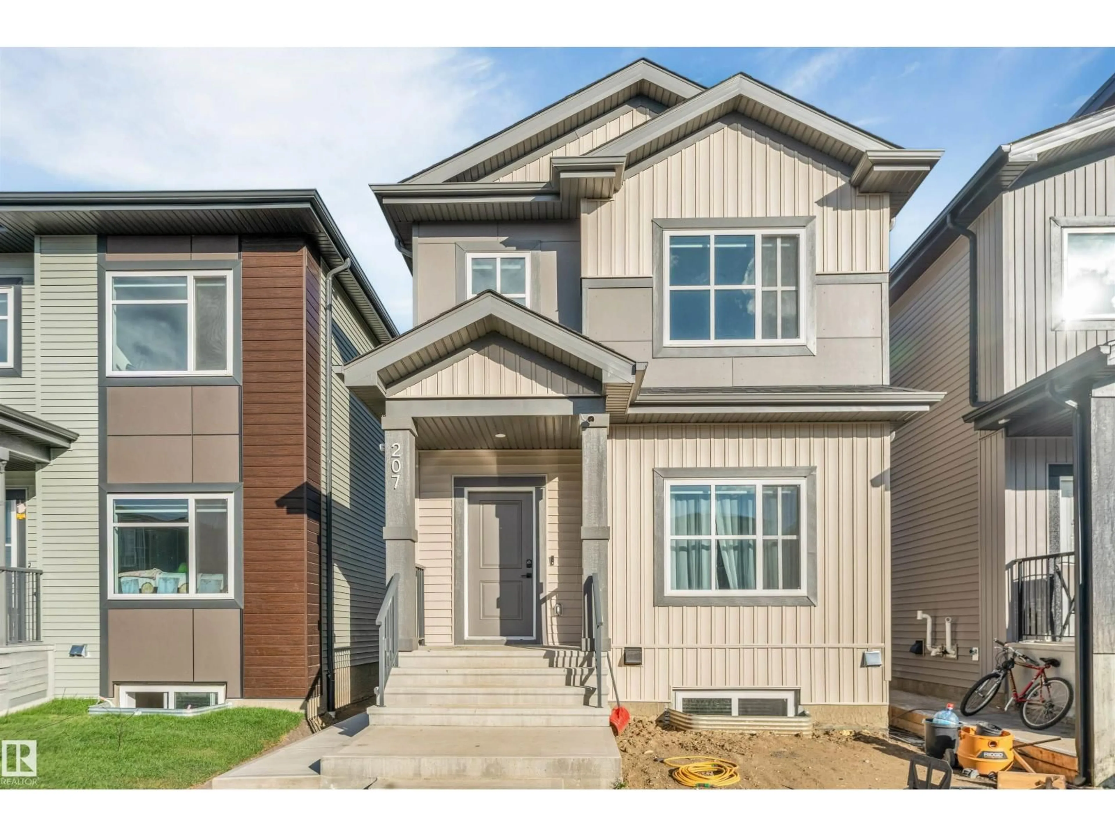 Home with brick exterior material, street for 207 25 ST, Edmonton Alberta T6X3K3