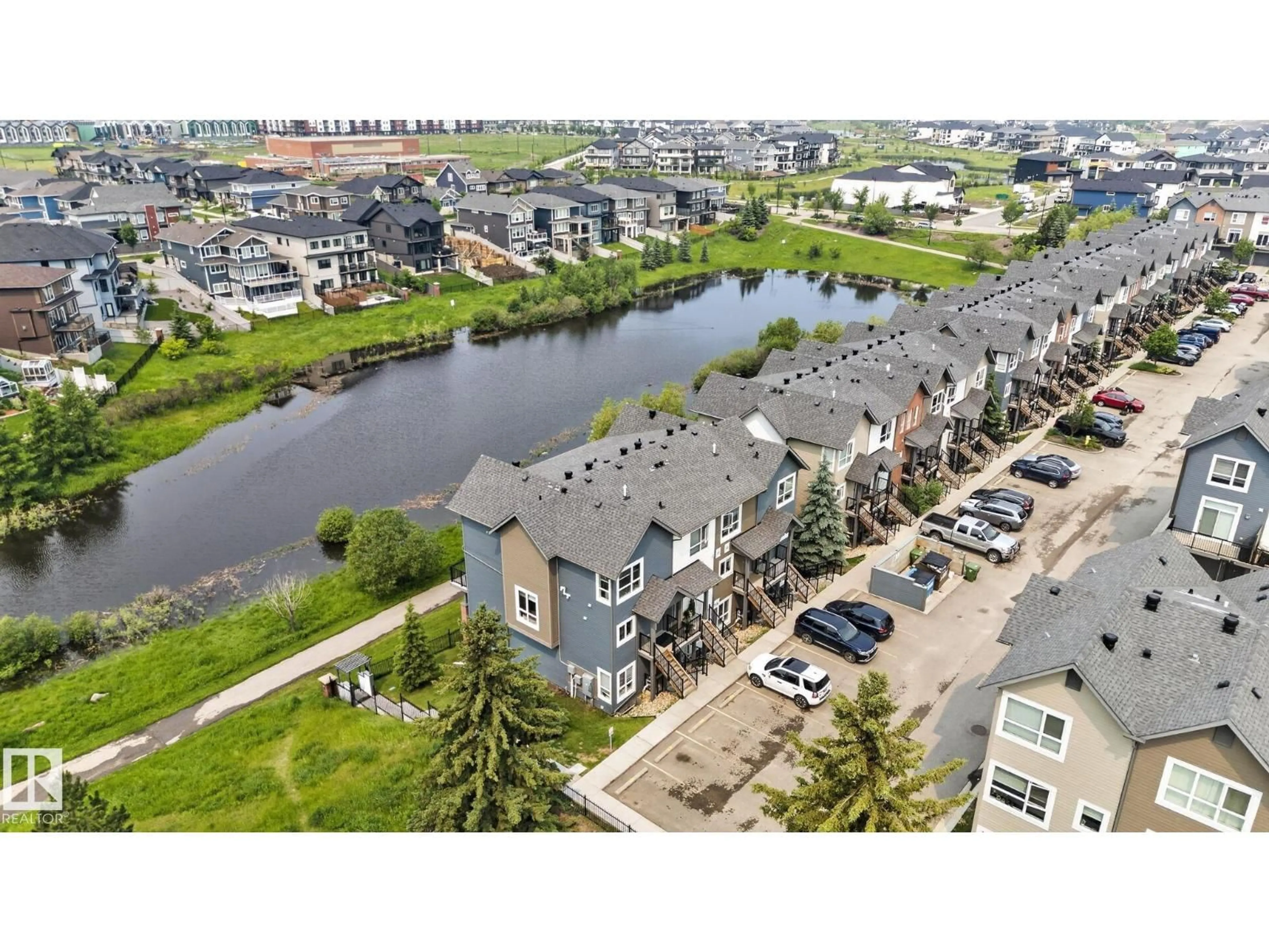 A pic from outside/outdoor area/front of a property/back of a property/a pic from drone, water/lake/river/ocean view for 90 2560 PEGASUS BV, Edmonton Alberta T5E6V4