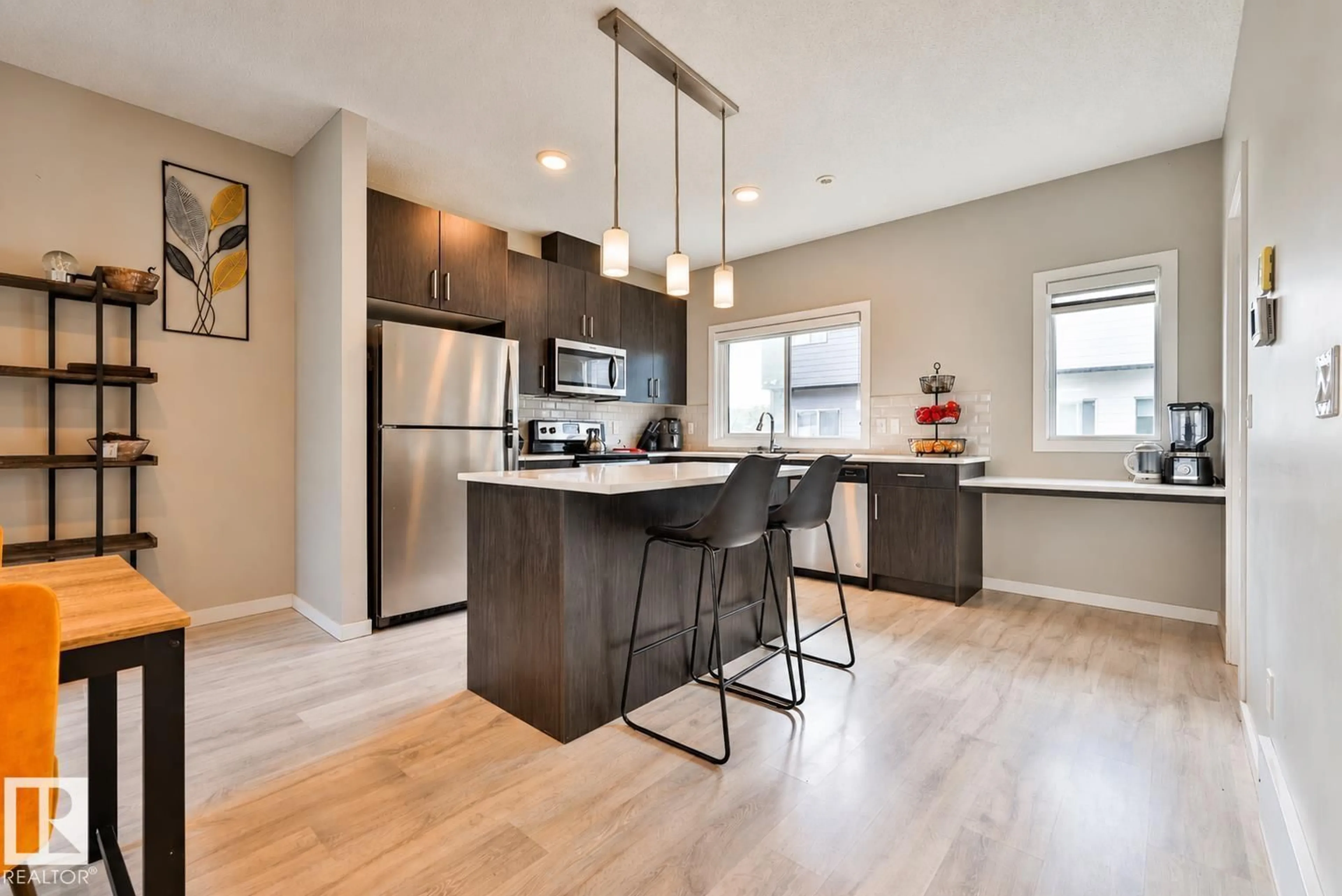 Open concept kitchen, wood/laminate floor for 26 - 804 WELSH DR, Edmonton Alberta T6X1Y8