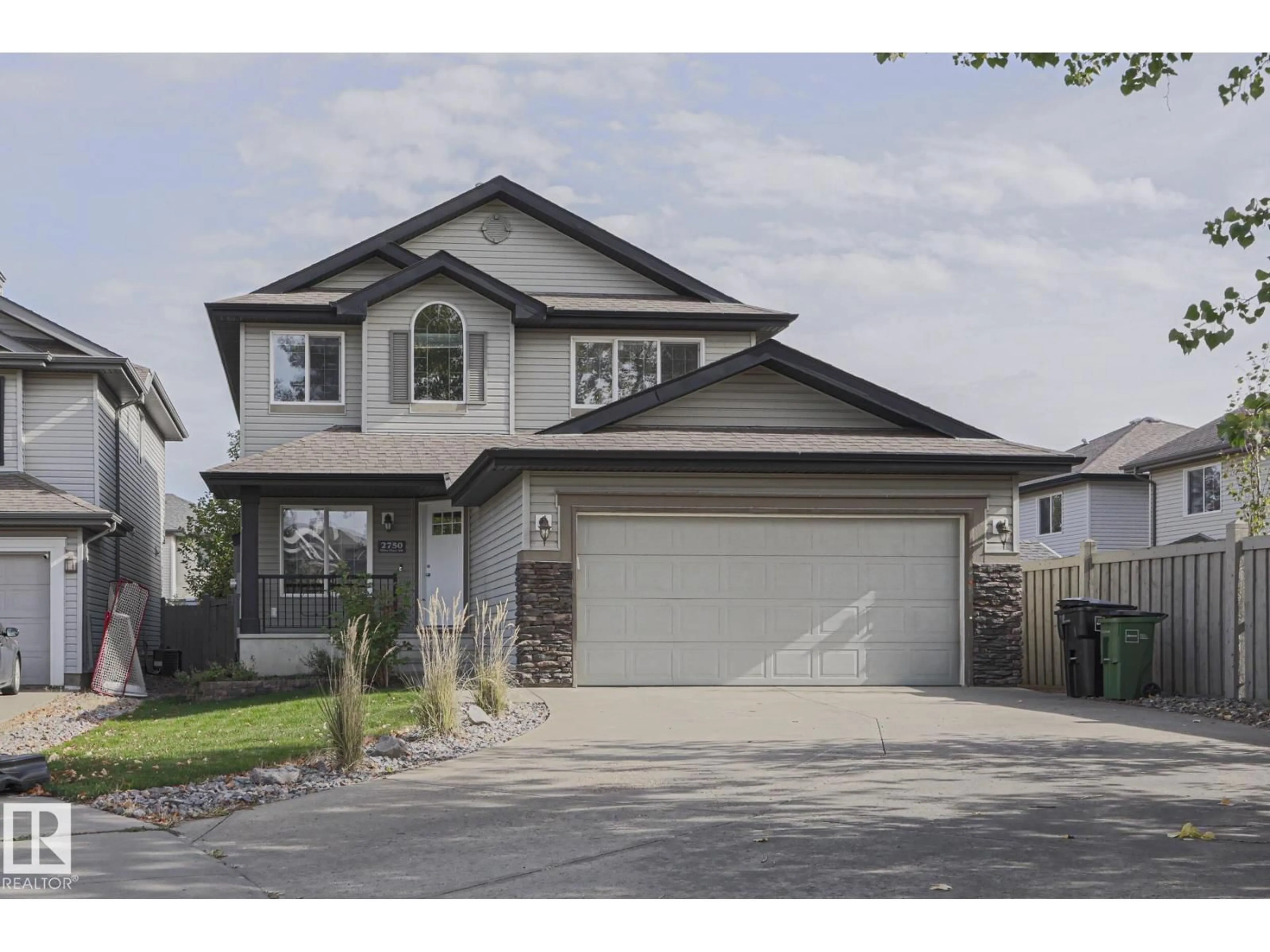 Home with vinyl exterior material, street for SW - 2750 MILES PL, Edmonton Alberta T6W0B3