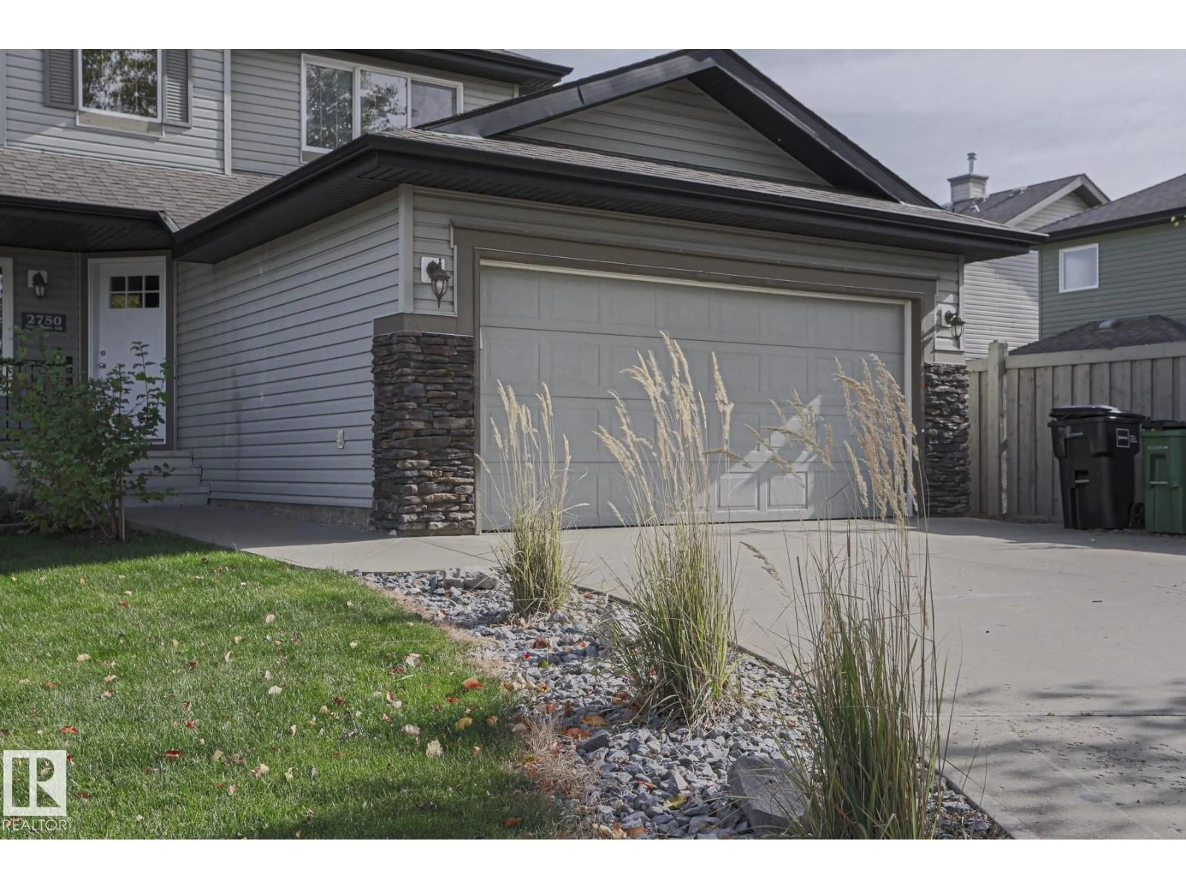 Home with vinyl exterior material, street for SW - 2750 MILES PL, Edmonton Alberta T6W0B3