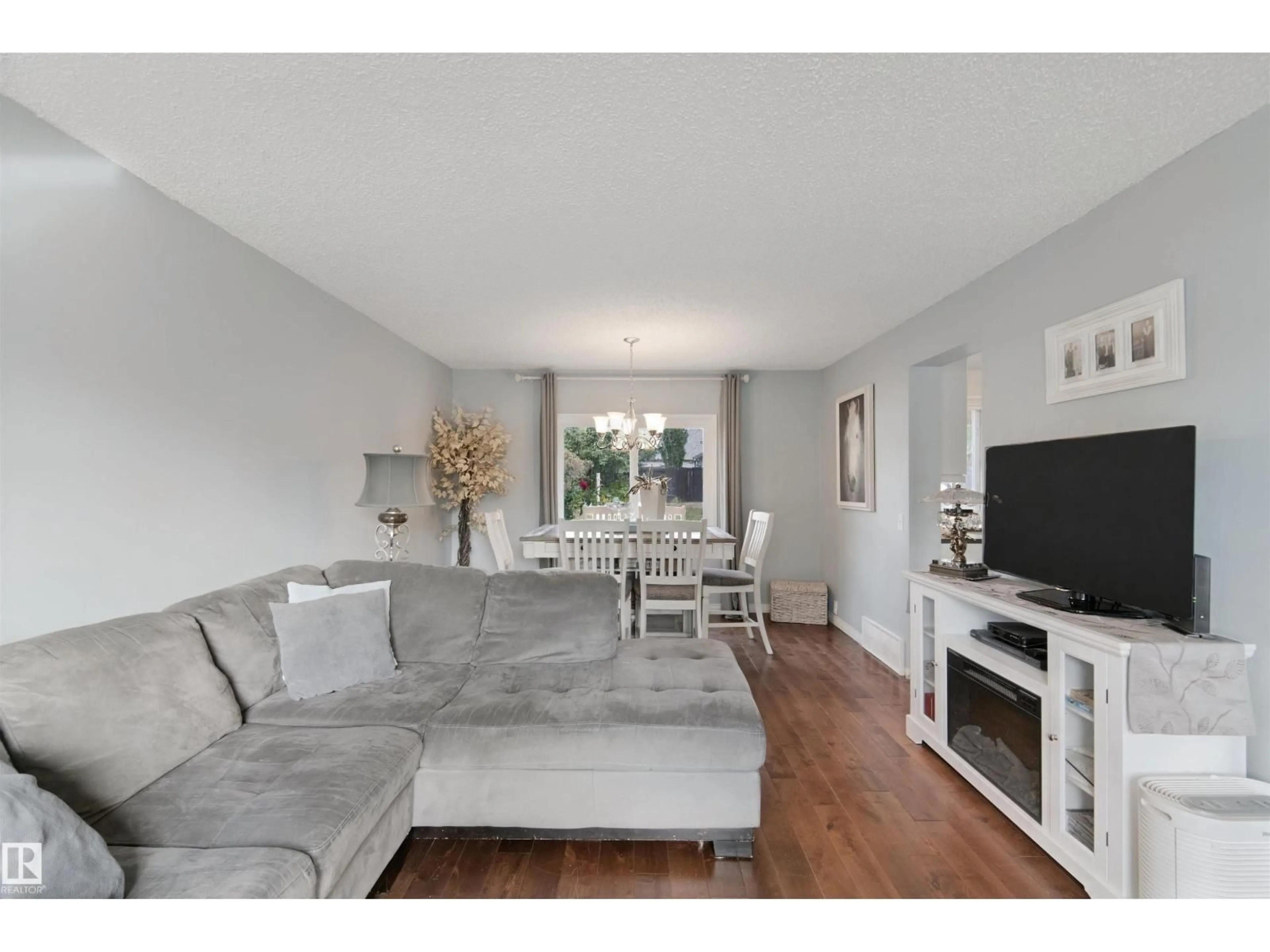 Living room with furniture, unknown for 4528 35 AV, Edmonton Alberta T6L3P9