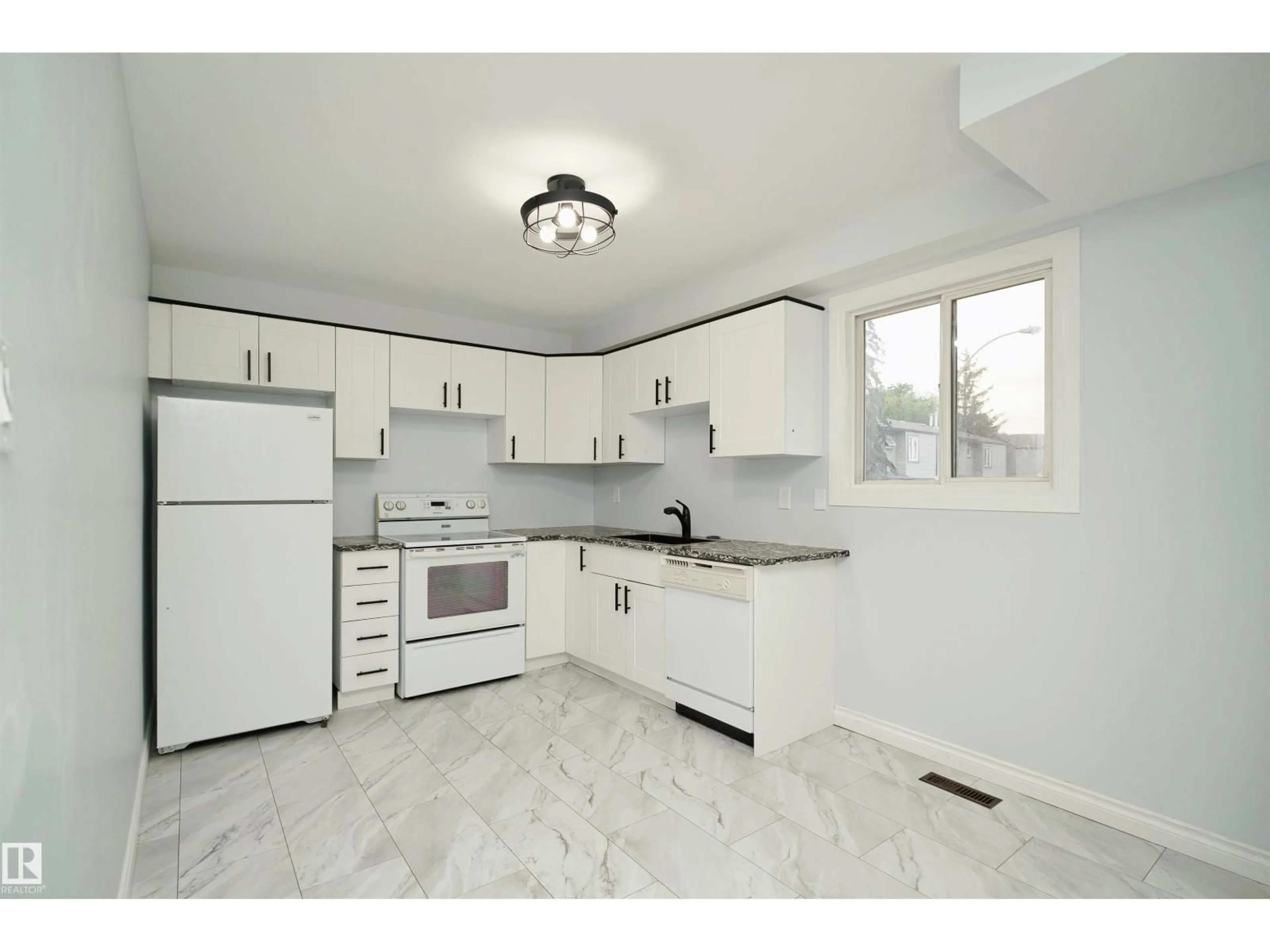 Open concept kitchen, ceramic/tile floor for 1679 LAKEWOOD RD, Edmonton Alberta T6K3B9