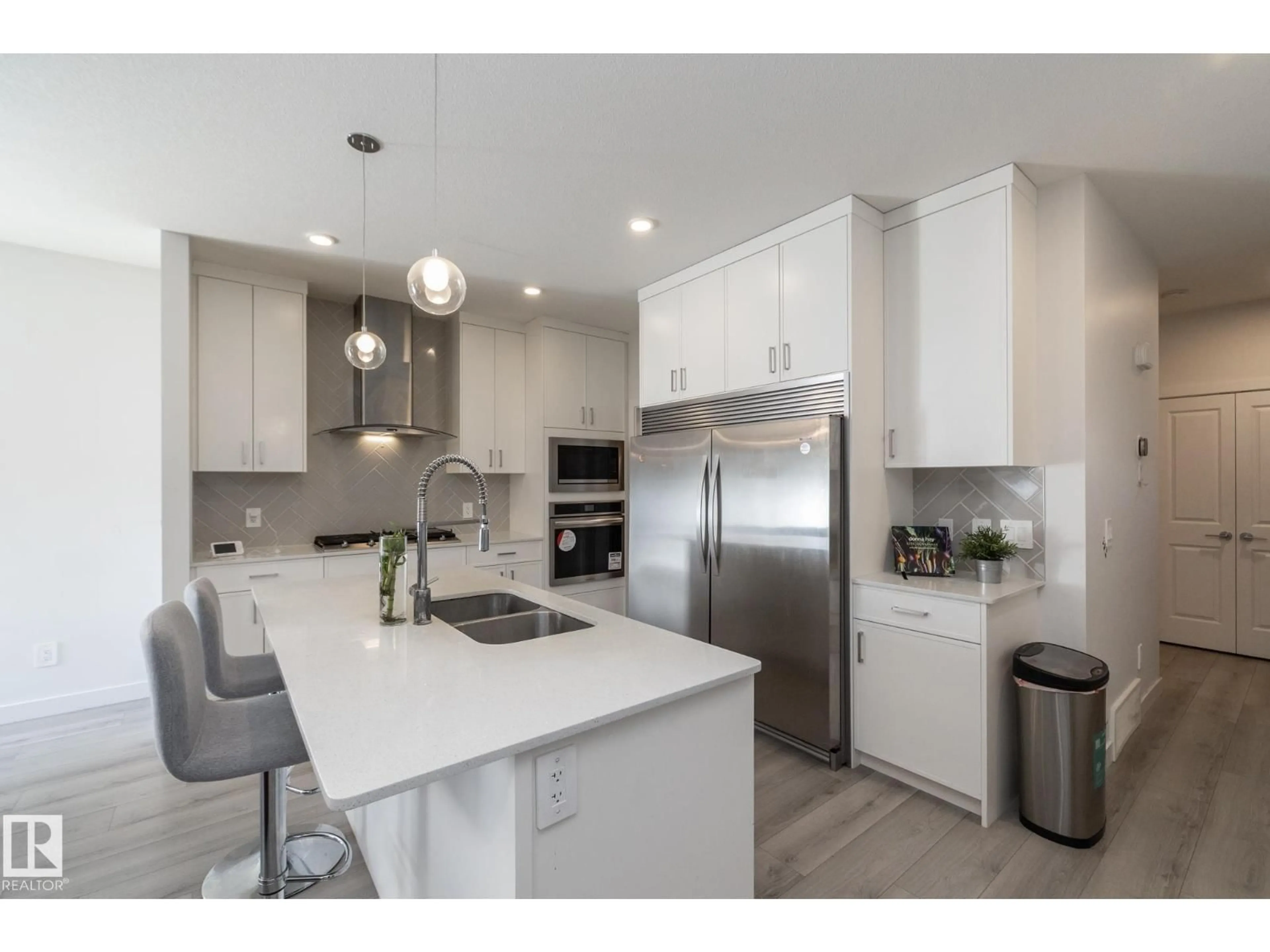 Open concept kitchen, ceramic/tile floor for NW - 3608 214 ST, Edmonton Alberta T6M1S3