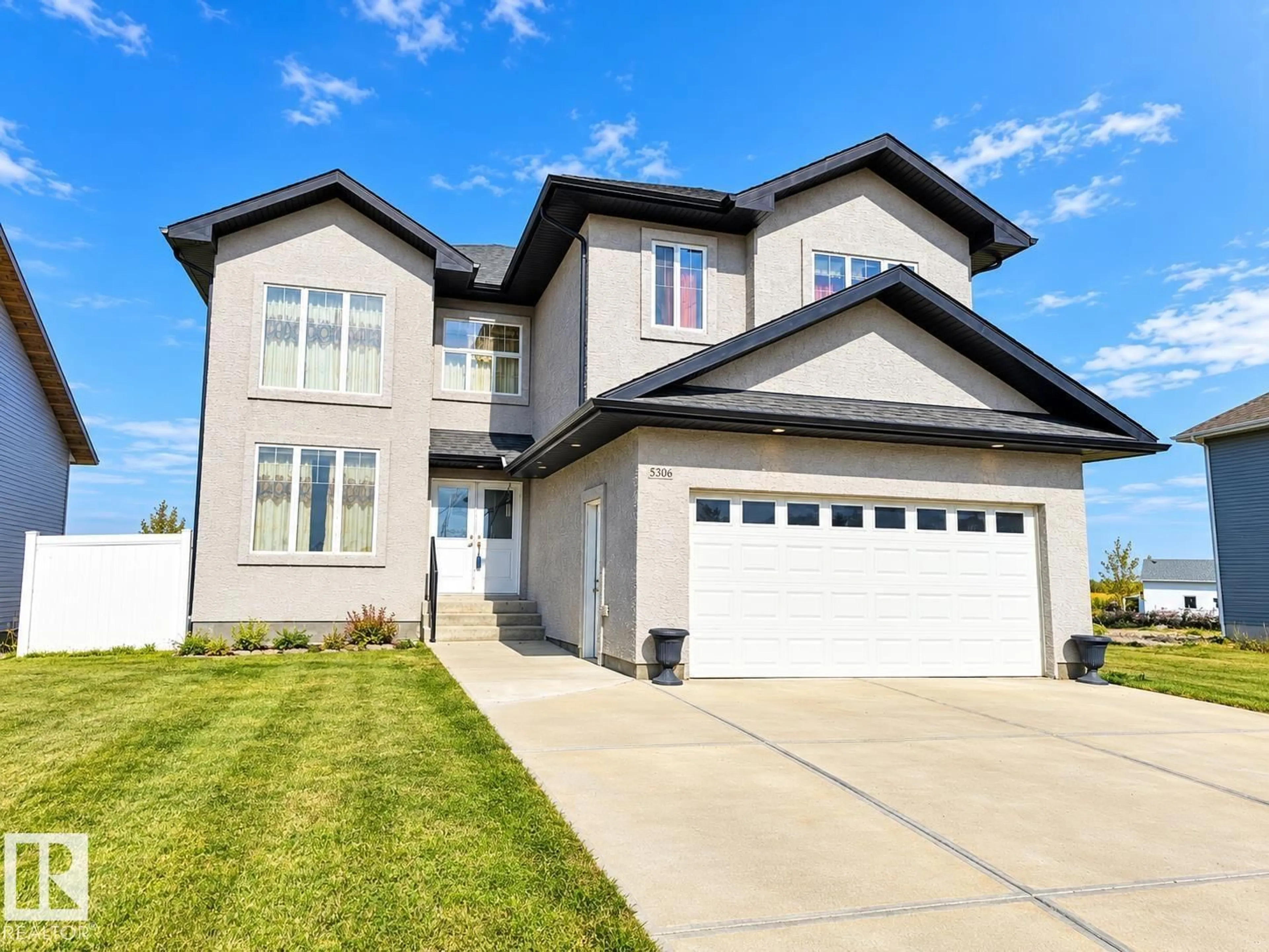 Home with vinyl exterior material, street for 5306 55 AV, Tofield Alberta T4J4J0