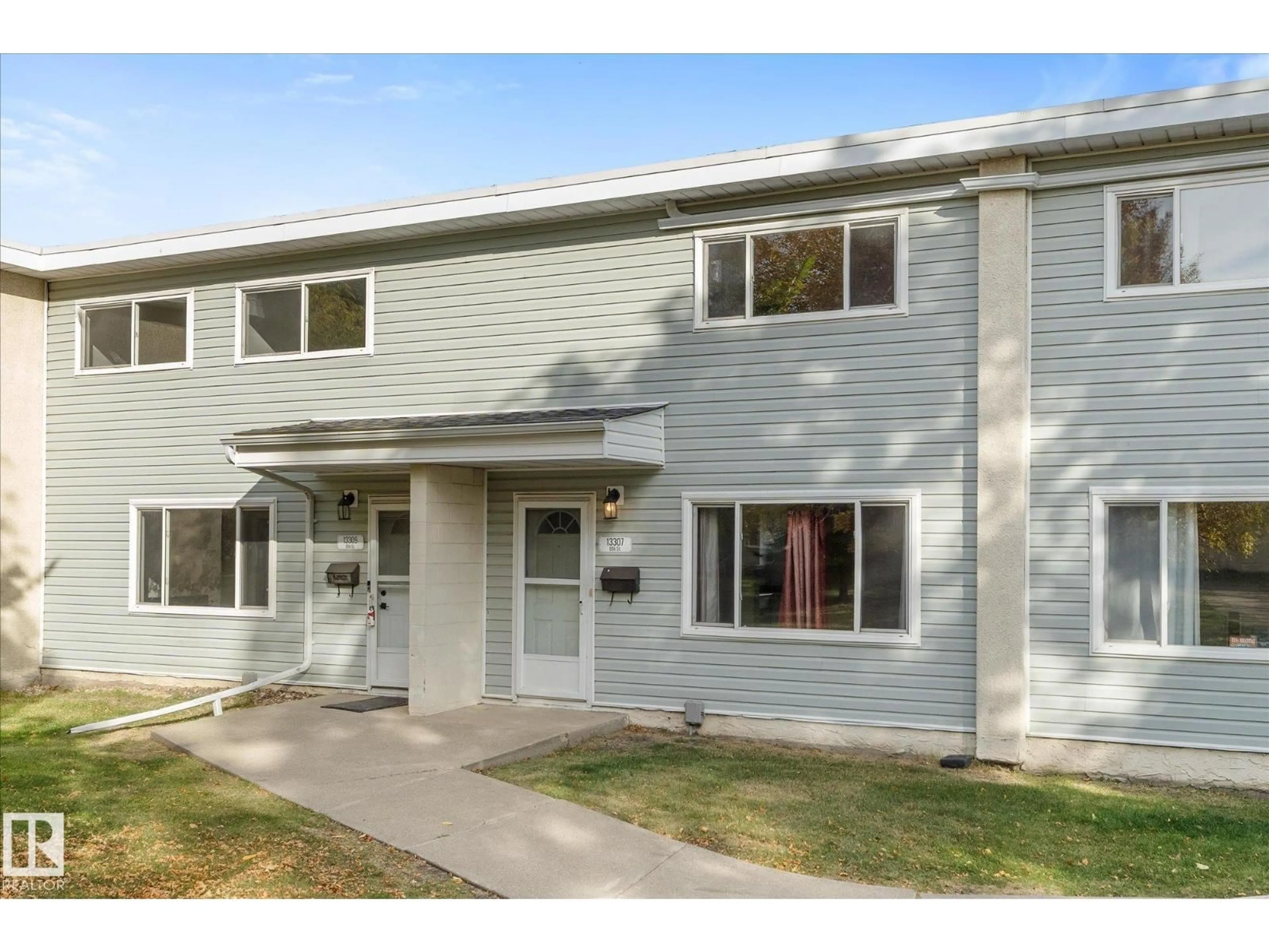 Home with vinyl exterior material, street for 13307 89A ST NW, Edmonton Alberta T5E3L2